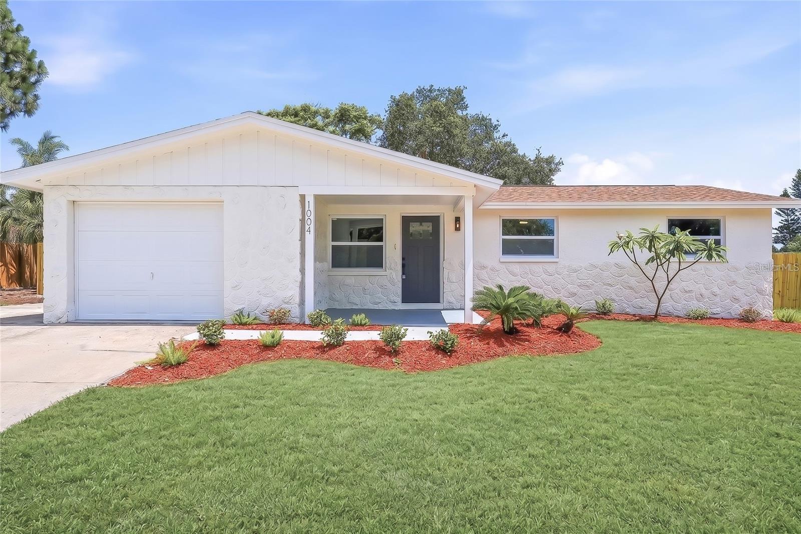 Welcome to this beautifully totally updated throughout 4/2/1 block home on a spacious corner lot in Tarpon Springs for a minimum 12-month rental! Non-smokers, 1 small dog up to 40 LBS, and no cats. Features include a covered front porch and incredible curb appeal. The inside is bright and has an open floor plan featuring luxury vinyl plank flooring throughout the main living spaces. The stunning kitchen is truly the heart of the home, showcasing beautiful quartz countertops, breakfast bar, all-new appliances, ample cabinet space, and an open layout that makes entertaining effortless. Every detail has been thoughtfully updated, giving the home a fresh, move-in-ready feel that today's renters are searching for. Major updates include brand-new thermal windows, a 2022 roof, a 2026 AC system, a 2025 water heater, updated fans, lighting, guest bathroom, and more. The spacious primary suite offers an en-suite bathroom featuring a luxurious walk-in shower with a built-in sitting bench and a stylish LED lighted mirror. Both bathrooms have quartz vanities. Three additional bedrooms provide flexibility for family, guests, a home office, or hobby space. Outside features a spacious fenced backyard and a relaxing on the back patio. The wooden privacy fence includes a convenient double gate, and the paved side front yard/garage parking area provides the perfect spot for a boat, trailer, additional vehicles and/or a RV. Located just minutes from the famous Tarpon Springs Sponge Docks, downtown shops and restaurants, Innsbrook Resort & Golf courses, Wall Springs Park, Fred Howard Park & Beach, Tarpon Springs Golf Course, Anclote River Park, and St Petersburg College in Tarpon Springs. This beautifully updated property offers the perfect combination of style, space, and location for a renter. Please have your realtor call owner for showings, further details, questions, and etc.