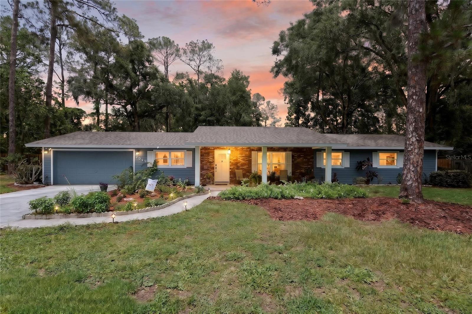 A home designed to surprise and delight you, this move-in ready home has been completely renovated and sits on a generous 0.35-acre lot in The Valley, no HOA! This inviting home blends solid, classic construction with fresh modern finishes, stylish upgrades, and valuable recent improvements throughout. New roof and soffits in 2025, HVAC and pool pump new in 2021, water heater new 2026, 2022 new double-pane impact windows, kitchen and both baths renovated, Luxury Vinyl plank flooring throughout, interior and exterior painting in 2025, crown molding and tall baseboards added in 2025, please see attached list of complete updates.

Step inside to find a bright, welcoming interior, with unusual features such as a secret bookshelf door between the great room and the relaxation room, a lovely decorative accent wall, a brick fireplace, and two new sliding doors leading to the screened porch (great feng shui) and outdoor living space.

The kitchen has been tastefully improved with new cabinetry, convenient pull-out shelves, a thoughtfully designed pantry also with pull-out storage and a motion-sensor light. Live-edge wood countertops complement the quartz countertops to share beauty and utility. Add to that all new stainless appliances (2025) and a pot filler over the stove and you have a very happy chef. Both bathrooms have been remodeled, including a freshly updated owner's bath with an in-drawer power outlet vanity with dual sinks and a rain showerhead, along with a two-directional handheld. The exhaust fan with Bluetooth connectivity, so you can listen to your music while you shower. The second bath is stylishly updated to include the same Bluetooth exhaust fan, as well as beadboard under a chair rail, and a ribbon of mosaic tile around the shower/tub that continues over the vanity.

All the major systems have been updated, giving you peace of mind for years to come. The front exterior has been enhanced with Hardie board, while the remaining three sides are durable concrete block construction.

The outdoor living areas are equally appealing, featuring a refreshing pool with a new liner (2026), a freshly painted screened porch floor, updated porch lighting (2026), a decorative poolside sitting area, and a new wood privacy fence that creates a more comfortable, private, and relaxing backyard retreat. The garage also offers practical modern convenience with a Level 2 EV charging outlet (2026), custom built-in shelving, hang from above shelving, and a new garage door opener (2026).

With its extensive upgrades, attractive finishes, spacious lot, and well-planned improvements, this home offers a wonderful combination of comfort, style, function, and long-term value. Come experience this home and you won't want to leave!