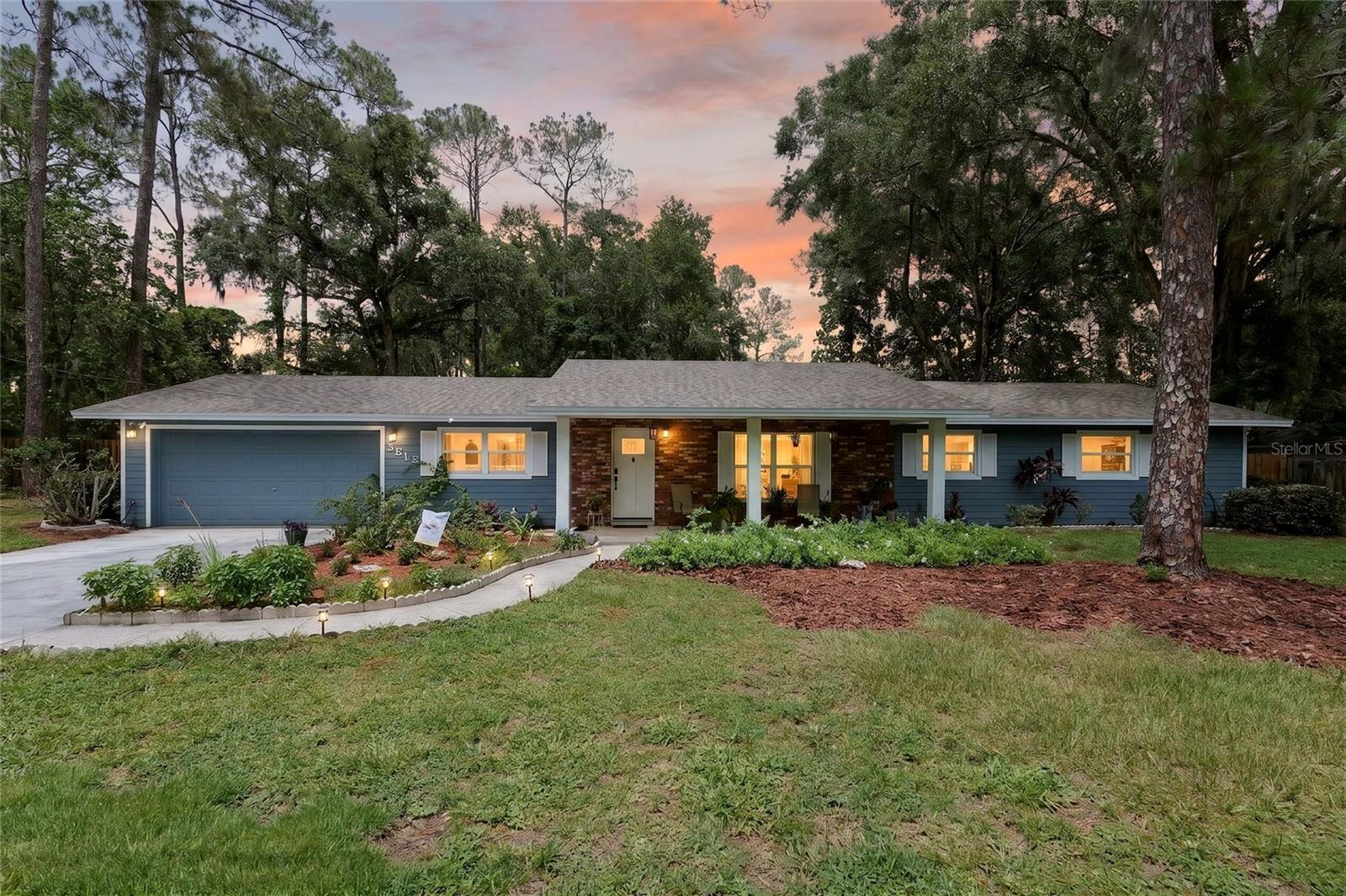 A home designed to surprise and delight you, this move-in ready home has been completely renovated and sits on a generous 0.35-acre lot in The Valley, no HOA! This inviting home blends solid, classic construction with fresh modern finishes, stylish upgrades, and valuable recent improvements throughout. New roof and soffits in 2025, HVAC and pool pump new in 2021, water heater new 2026, 2022 new double-pane impact windows, kitchen and both baths renovated, Luxury Vinyl plank flooring throughout, interior and exterior painting in 2025, crown molding and tall baseboards added in 2025, please see attached list of complete updates.

Step inside to find a bright, welcoming interior, with unusual features such as a secret bookshelf door between the great room and the relaxation room, a lovely decorative accent wall, a brick fireplace, and two new sliding doors leading to the screened porch (great feng shui) and outdoor living space.

The kitchen has been tastefully improved with new cabinetry, convenient pull-out shelves, a thoughtfully designed pantry also with pull-out storage and a motion-sensor light. Live-edge wood countertops complement the quartz countertops to share beauty and utility. Add to that all new stainless appliances (2025) and a pot filler over the stove and you have a very happy chef. Both bathrooms have been remodeled, including a freshly updated owner's bath with an in-drawer power outlet vanity with dual sinks and a rain showerhead, along with a two-directional handheld. The exhaust fan with Bluetooth connectivity, so you can listen to your music while you shower. The second bath is stylishly updated to include the same Bluetooth exhaust fan, as well as beadboard under a chair rail, and a ribbon of mosaic tile around the shower/tub that continues over the vanity.

All the major systems have been updated, giving you peace of mind for years to come. The front exterior has been enhanced with Hardie board, while the remaining three sides are durable concrete block construction.

The outdoor living areas are equally appealing, featuring a refreshing pool with a new liner (2026), a freshly painted screened porch floor, updated porch lighting (2026), a decorative poolside sitting area, and a new wood privacy fence that creates a more comfortable, private, and relaxing backyard retreat. The garage also offers practical modern convenience with a Level 2 EV charging outlet (2026), custom built-in shelving, hang from above shelving, and a new garage door opener (2026).

With its extensive upgrades, attractive finishes, spacious lot, and well-planned improvements, this home offers a wonderful combination of comfort, style, function, and long-term value. Come experience this home and you won't want to leave!
