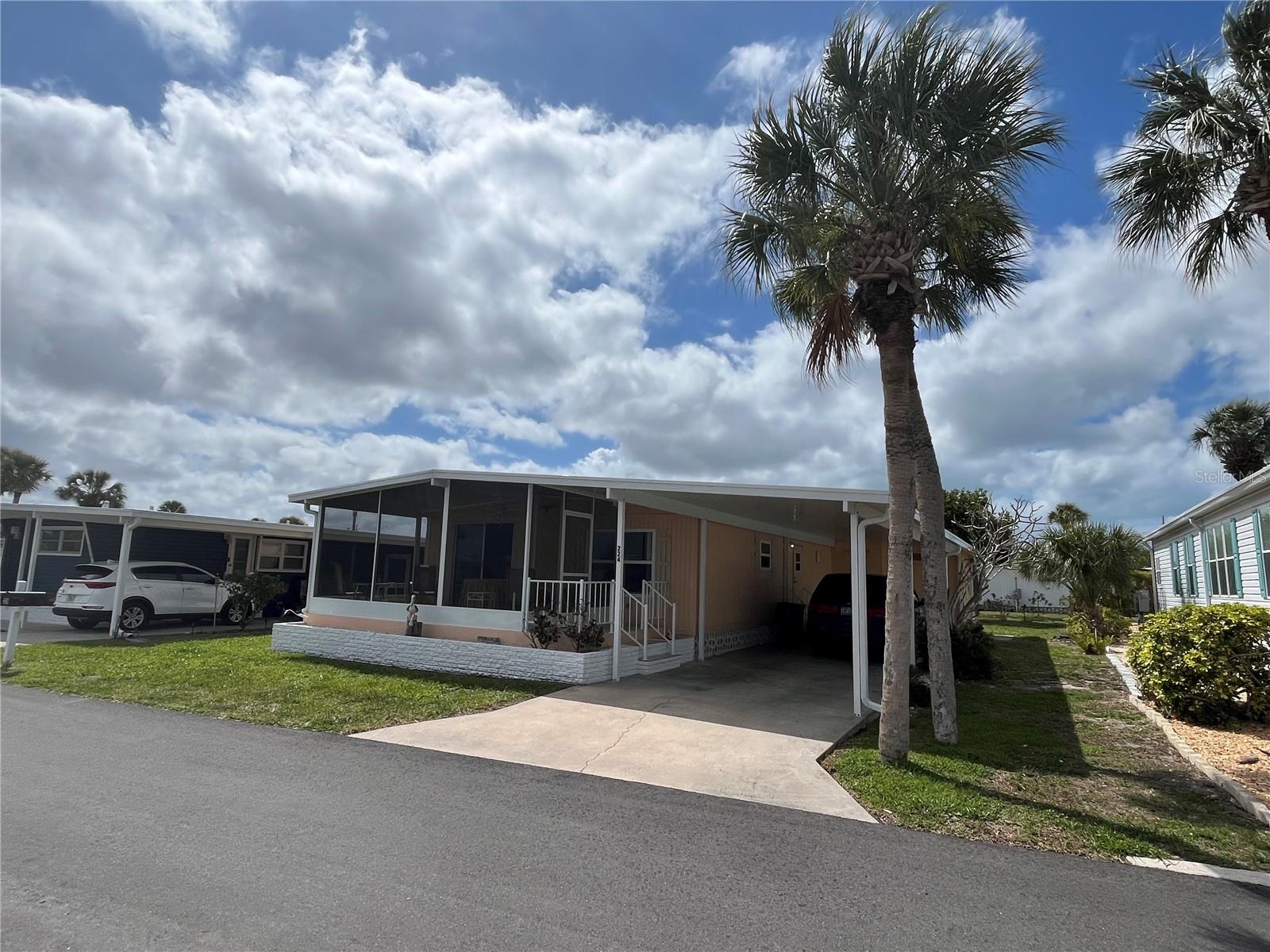 A quiet street with new front screened porch and new carport, newer windows, AC in 2022, Newer kitchen cabinets, newer appliances, Newer bath updates, 2 huge walk-in closets, New exterior electric panel, Plywood sub flooring under beautiful vinyl flooring though out, this home has a huge shed and a quant rear patio too. 
Venice Isle is the premier resident owned over 55 Mobile home Park in Venice. There are close to 1000 homes with the most active residents. There is always something going on for you to do. We have many Park gatherings and first rate shows on site. The Park has every amenity you can imagine. Come take a walk through both of our 2 clubhouses and make yourself at home. The Park has 2 tennis courts, a fitness center, 2 heated pools, 2 hot tubs, saunas, putting greens, shuffleboard, Bocce ball, miniature golf, art rooms, pool room, TV lounges, card rooms, library, horseshoes, ceramic kilns, 2 huge ballrooms, Sunday services and much more!