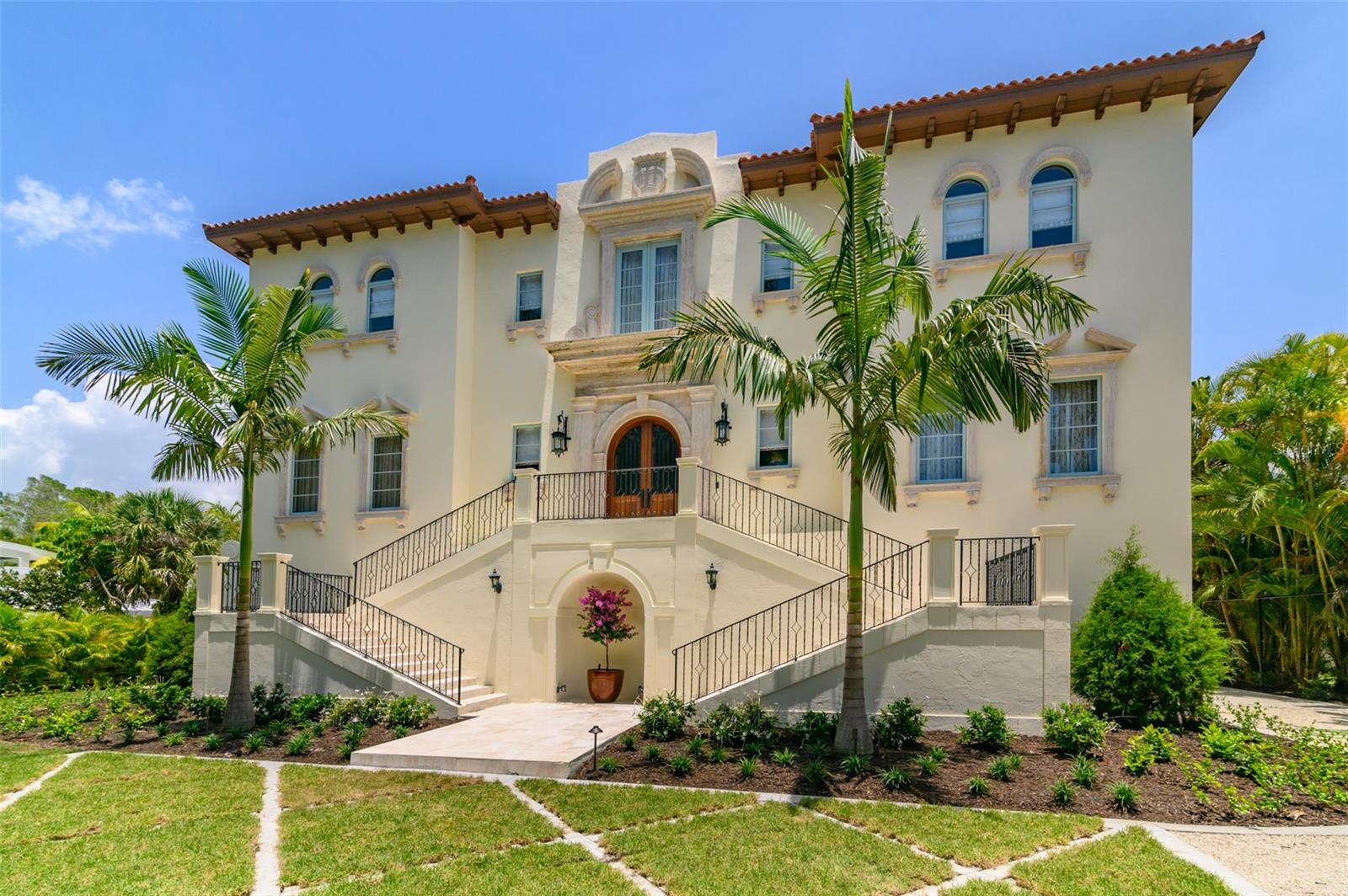 With the recent price reduction, this home is Siesta Keys best valued waterfront property on the market at 928 dollars a square foot. You cannot build at this price point on Siesta Key.
While evoking the vital spirit of that sundrenched region of Europe, the waterfront masterpiece Palladian Villa brings a taste of 17th century opulence to Siesta Key. Boasting 120 feet of waterfront, the sellers have just completed a $1.5 million dollar remodel on this custom-built Cocoanut Bayou home. The enviable location is protected by Roberts Bay providing direct access to the Intracoastal Waterway and the Gulf of Mexico. This private dream villa is nestled behind a double gate and features 8,571 square feet of living space with a covered terrace that expands the entire width of the home. The outdoors are an essential part of Florida living and this residence truly excels in offering a resort-like experience. You enter through custom doors into the grand foyer, then under the arched staircase into the grand salon with its 24-foot ceilings, Italian-inspired marble gas fireplace and stunning terrace views. The terrace and its lounge area along with the summer kitchen provide the perfect atmosphere for dining and entertaining. French doors open onto the terrace from every room on the east side of the home allowing you to flow freely from one room to another. Three 17th-century marble Italian-inspired gas fireplaces, hand-chiseled travertine flooring, deep crown molding, ornamental friezes and carved cornices embellish this home with its first-floor 12-foot ceilings. Four perfectly balanced en-suites feature a modern master bath and dual walk-in closets, two of which open onto the second-floor terrace with expansive bay views. The gourmet kitchen includes two Sub-Zero refrigerators, freezer drawers with ice makers, two Miele dishwashers, double Wolf ovens and warming drawers and a gas range with a custom faux-finished vented rangehood. The expansive kitchen seamlessly connects to the formal dining room with a sophisticated butler’s pantry. Custom cabinetry and accent lighting with granite counters and a 140-plus bottle Sub-Zero wine cooler are just a few of the luxuries to help keep your guests entertained. The large study and back hallway leading to the family room are the perfect spots to end your day. The newly landscaped yard and irrigation make this home easy to maintain and carefree. Take advantage of the full under-house garage, large enough for 12 cars or storage of your favorite toys. Garage access to the totally revamped custom elevator travels to all three floors of the home. A heated saltwater pool and spa surrounded by Malibu Marble with multiple entertainment areas, along with 120 feet of deep water with a concrete seawall and a composite wood dock, make this home the perfect Siesta Key residence. Sarasota arts, culture, and urban amenities are just a bridge away. Room Feature: Linen Closet In Bath (Bedroom 1). Room Feature: Linen Closet In Bath (Bedroom 2). Room Feature: Linen Closet In Bath (Bedroom 3).