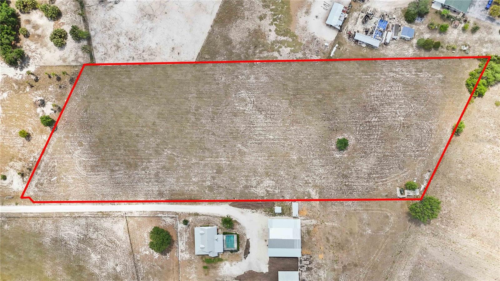 Welcome to this beautiful 5 + acre parcel on Wachula Road, Myakka, FL a rare opportunity to own a versatile piece of land in a peaceful, rural setting. This property is completely cleared and level, offering the perfect canvas for your dream home, a working farm, or a private retreat. Whether you're looking to raise animals, grow crops, or simply enjoy wide-open space, this land provides the freedom and flexibility to do it all. With no HOA or deed restrictions, you’re free to design the lifestyle you’ve always wanted, bring your boats, RVs, ATVs, and animals! Surrounded by nature and with easy access to nearby amenities in Myakka City, Lakewood Ranch, and Sarasota, you’ll enjoy the best of both worlds: serenity and convenience. This is an excellent opportunity for builders, homesteaders, or investors looking to secure land in one of Florida’s growing rural areas. Don't miss your chance to own a slice of country paradise!
