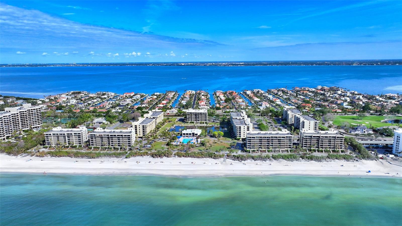 Spacious 3-Bedroom End-Unit Residence in Sought-After Beachplace

Welcome to this beautifully maintained three-bedroom, two-bath end-unit condominium offering exceptional natural light, generous living spaces, and serene views in one of South Longboat Key’s most desirable beachfront communities.

The open living and dining areas are thoughtfully designed for comfort and entertaining, featuring expansive sliders and windows that flood the space with sunlight and create seamless indoor-outdoor flow. A spacious living room opens to a south-facing screened lanai—perfect for enjoying morning light, golf course views, and gentle coastal breezes.

The kitchen is bright and functional, offering ample cabinetry, full appliance package, and convenient in-unit laundry tucked neatly into a dedicated closet. Adjacent dining space provides flexibility for everyday living or hosting guests.

The primary suite is generously sized and enjoys tranquil views, abundant natural light, and direct access to the lanai. Two additional bedrooms are versatility for guests, family, or a home office, all thoughtfully laid out to maximize privacy and comfort.

Being an end unit, this residence benefits from additional windows and enhanced light throughout, creating an airy, welcoming atmosphere. Neutral finishes and tasteful furnishings allow for immediate enjoyment while offering an excellent canvas for personalization.

Residents of Beachplace enjoy resort-style amenities, including a heated pool with lap lanes, spa, tennis courts, a fully equipped clubhouse with gathering spaces, on-site management, and private deeded beach access complete with lounge chairs and umbrellas. The community’s prime location places you moments from St. Armands Circle, Longboat Key Club, and downtown Sarasota’s dining, shopping, and cultural attractions.

This well-cared-for residence presents an outstanding opportunity—whether as a primary home, vacation retreat, or income-producing investment in a premier Gulf-front community.