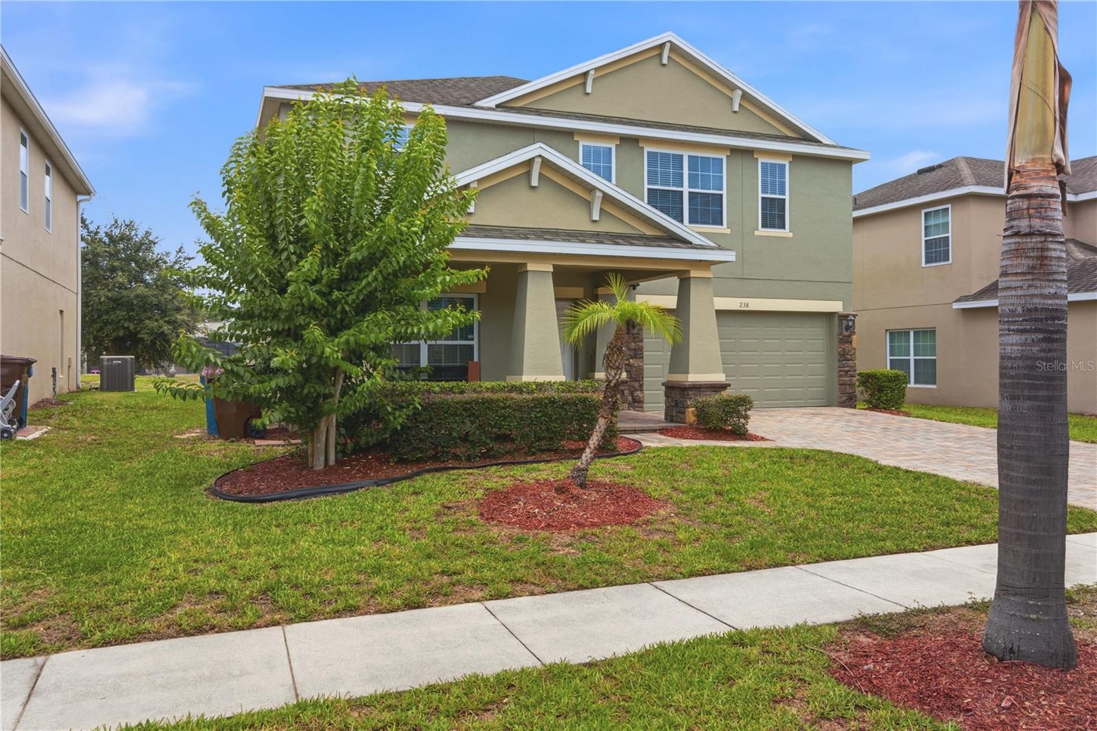 Welcome to this spacious and energy-efficient 5-bedroom, 3-bathroom home located within a desirable gated community in the heart of Davenport. Offering over 3,300 square feet of thoughtfully designed living space, this home combines comfort, style, and functionality with an unbeatable Central Florida location.

One of the home's most valuable features is the fully paid-off solar system, which will be conveyed to the new owner at closing, providing significant long-term energy savings and added value. The property also enjoys a premium homesite with a dry retention area behind the home, offering additional privacy and peaceful views with no direct rear neighbors.

Inside, you'll appreciate the elegant finishes and spacious layout. The main floor features tile flooring throughout, creating a clean, modern look while providing durability and easy maintenance. The chef-inspired kitchen is designed for both everyday living and entertaining, featuring beautiful quartz countertops, a cooktop, double wall ovens, abundant cabinetry, and generous counter space for preparing meals and gathering with family and friends.

A standout feature of the home is the dedicated media room, complete with theater seating and an overhead projector included, creating the perfect space for movie nights, sports viewing, and entertaining guests.

Step outside to enjoy Florida living at its finest. The covered and screened rear lanai overlooks the peaceful dry retention area and features tile flooring and ceiling fans, providing a comfortable outdoor retreat year-round. Beyond the screened enclosure, a large extended patio slab offers additional space for grilling, outdoor dining, entertaining, or simply relaxing while enjoying the open views.

Residents of this sought-after gated community enjoy amenities including a playground and tennis courts, adding to the lifestyle appeal of this exceptional neighborhood.

Located just minutes from Walt Disney World Resort, this home is also conveniently close to Posner Park, where you'll find popular retailers such as Target Corporation, Best Buy, Dick's Sporting Goods, Ross Stores, Michaels, and JCPenney, along with a variety of restaurants, entertainment, and everyday conveniences.

This exceptional property offers the perfect combination of paid-off solar, a gated community, premium outdoor living space, a private homesite, luxury kitchen upgrades, and a dedicated media room. Don't miss this opportunity to own a move-in-ready home in one of Davenport's most convenient locations. Schedule your private showing today!