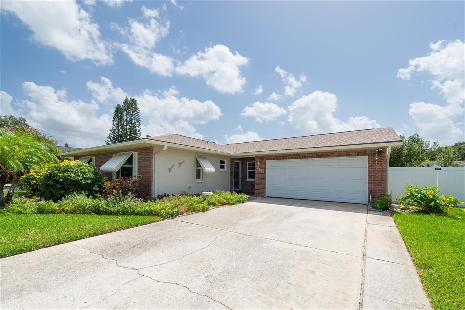 Discover the best of Florida living in this BEAUTIFULLY MAINTAINED 2-BEDROOM, 2-BATH, 2-CAR GARAGE HOME with a MASSIVE BONUS ROOM in the highly desired HEATHER HILLS neighborhood of Largo. Just minutes from INDIAN ROCKS BEACH, this home offers the perfect blend of comfort, privacy, and opportunity. Inside, an OPEN FLOOR PLAN features a spacious living/dining/kitchen area with TILE flooring. The kitchen includes high-end STAINLESS appliances, Corian countertops, light oak cabinets along with a dishwasher and a functional layout ideal for entertaining. The generous primary suite offers a WALK-IN CLOSET and an ensuite bath with a walk-in SHOWER. The second bedroom provides excellent closet space, and the well-appointed guest bath includes a TILED WALK-IN SHOWER. The incredible BONUS ROOM adds approximately 350 square feet of additional living space, complete with central A/C and electric. Currently used as a Florida room with a relaxing SPA, this versatile area might be converted to an office, third bedroom, hobby space—or a combination of all three. Step outside to your private oasis: a FULLY FENCED BACKYARD, ideal for pets, play, and outdoor living, plus a STORAGE SHED WITH ELECTRICITY for added convenience and sprinkler system for the lawn. The patio has REMOTE-CONTROLLED awnings for added comfort.
With NO HOA, NO REQUIRED FLOOD INSURANCE (FLOOD ZONE X and NON-EVACUATION), and a peaceful location near Largo Mall, Seminole City Center, the Pinellas Trail, parks, dining, golf, medical facilities, and airports, this move-in ready home is packed with potential.
Whether you're seeking a full-time residence, seasonal retreat, or smart investment, this property checks every box. Schedule your private showing today and embrace the ultimate Florida lifestyle.