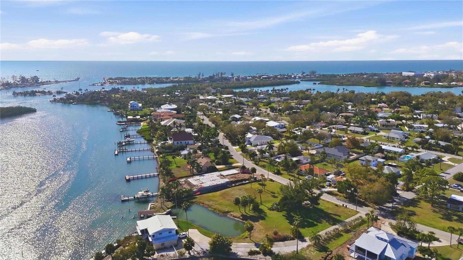 New to market.  Bayfront homesite on Bayview Parkway in Nokomis with southern exposure. Approximately 0.49 acres with a new seawall along Dona Bay, suitable for new construction with open bay views.

Direct water access toward the Gulf of Mexico and Intracoastal Waterway. Parcel includes both sides of Snook Bay inlet and an existing boathouse. Buyer to verify navigability, access, and water depths.

Area known for dolphin and coastal wildlife activity.

Surrounded by newer construction within a developing waterfront area. Located between Sarasota and Venice Island with access to Gulf beaches, dining, golf, shopping, and cultural amenities. Nokomis Beach is located nearby.

Waterfront lot with open bay views and build potential.