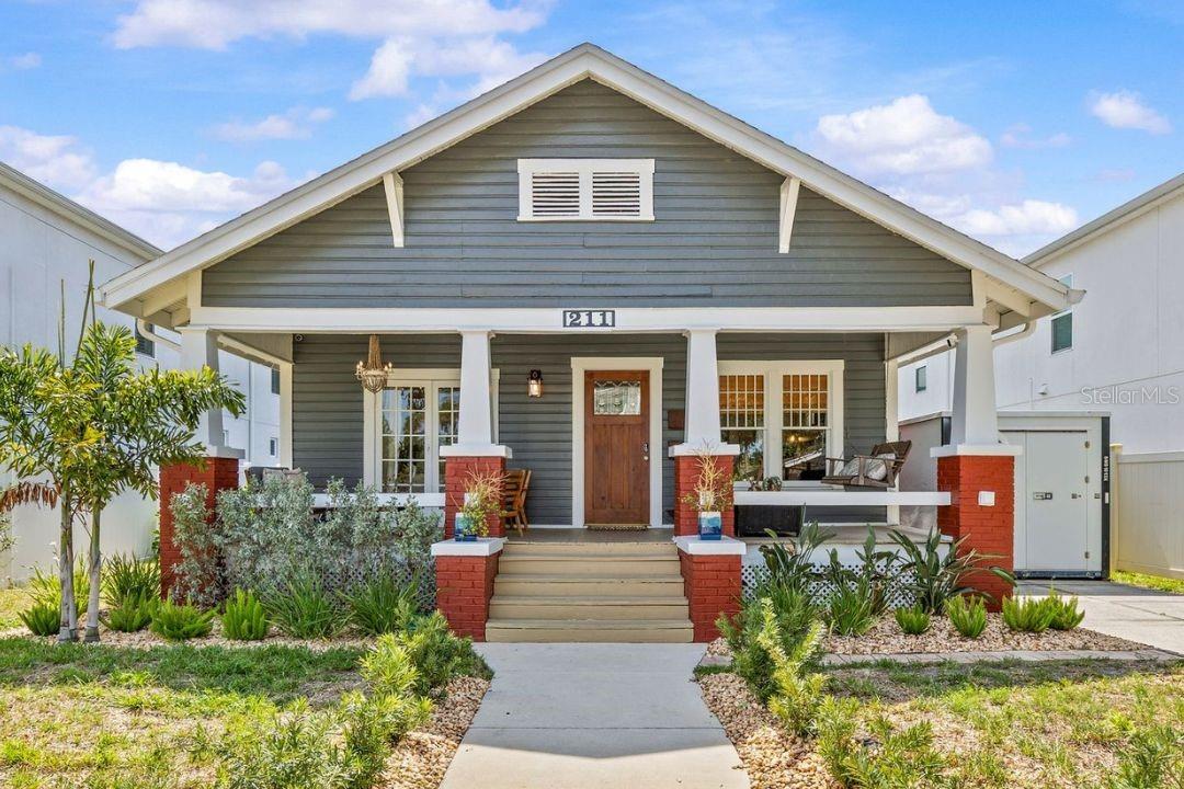 Living within the heart of South Tampa’s SOHO and Hyde Park districts provides the perfect blend of urban and historic lifestyle.  211 S Albany Ave affectionately know as “SOHO Roost” is a special opportunity to own a move-in ready vintage 1920’s craftsman bungalow with an ADDITIONAL full detached guest home built in 2015.  This perfect combination of living spaces provides the new owner a main residence of 3 bedrooms, plus office and 2 baths plus 1,295 sq ft under roof.  The guest residence consists of 1 bedroom, 1 bath, 736 sq ft of living space and two parking spaces.  The moment you approach this home you will feel the historic nature emanating from the large front porch, with tongue and groove ceiling, craftsman finishes and leisure swing.  Once you enter the residence you will enjoy the open floor plan with new wood flooring and abundance of natural light.  The kitchen has been fully renovated and enhanced with quartz countertops, beautiful wood cabinets, new stainless appliances and expansive storage. The master suite has a NEW en suite bathroom and connects to the rear screened in porch, while the 2 additional bedrooms share the freshly renovated  2nd full bath. Two unique features of this home is the additional office space that is accessed from the 2nd bedroom, as well as the French doors that provide access to the front porch via the 3rd bedroom.  Beyond the main residence is the wonderful guest house that is well appointed with a full kitchen, open living and dining space, full sized bedroom and bath plus a separate laundry and 2 parking spaces via alley access.  Additional benefits of this home include newer roof main home (2021), new appliances, repainted interior and exterior, numerous windows replaced, main home gas tankless water heater. The location of this residence is phenomenal with a high walkability factor to SoHo restaurants, Publix and Buddy Brew coffee shop.  Soho Roost is also just down the street from Hyde Park Village with its multiple restaurants, shopping and entertainment.  Great flexibility of this property as a primary residence, longer term or short term rental and even the ability to build with its RM-16 multi family residential zoning.  This property is also located in the top-rated Plant High School, Wilson Middle and Mitchell Elementary boundaries.