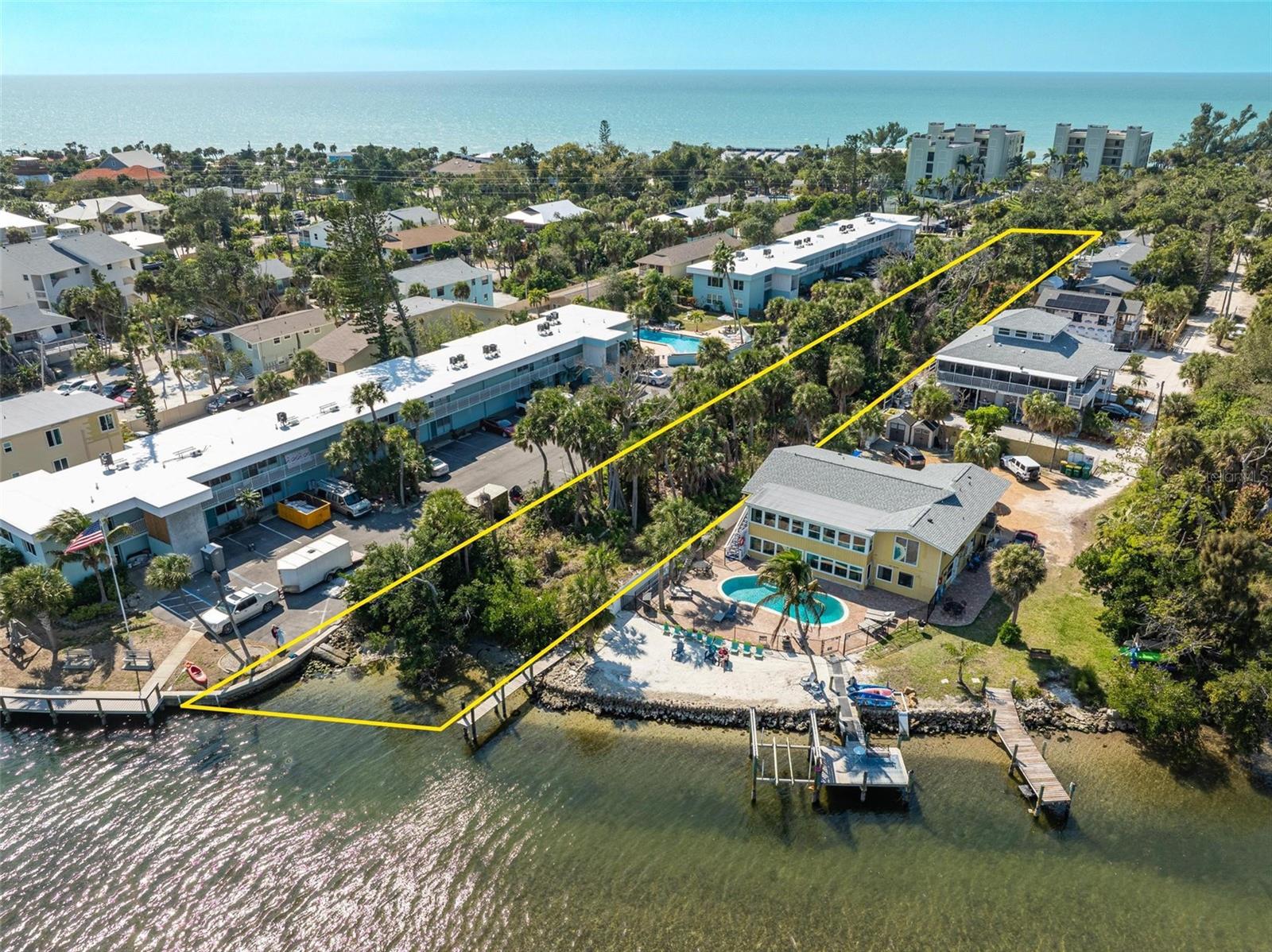 INVESTOR ALERT!! Exceptional opportunity to acquire a buildable waterfront property along the coveted Manasota key. Situated directly on Lemon Bay, this parcel offers expansive water views of Lemon Bay and SHORT TERM RENTALS are permitted in this area. Land is Zoned RMF-10 (10 units an acre), the property presents significant upside for builders and investors seeking redevelopment, or income-producing potential. Whether you envision a luxury single-family estate, boutique multifamily project, or a strategic hold for future appreciation, the density designation provides flexibility rarely found in this part of the island. Just mere minutes to the main beach and restaurants. The island is known for its quiet, laid back atmosphere, and with its wide range of outdoor activities such as boating, fishing, kayaking and of course beachcombing. A true investor's opportunity on a blank canvas. Owner may consider seller financing for the right terms.