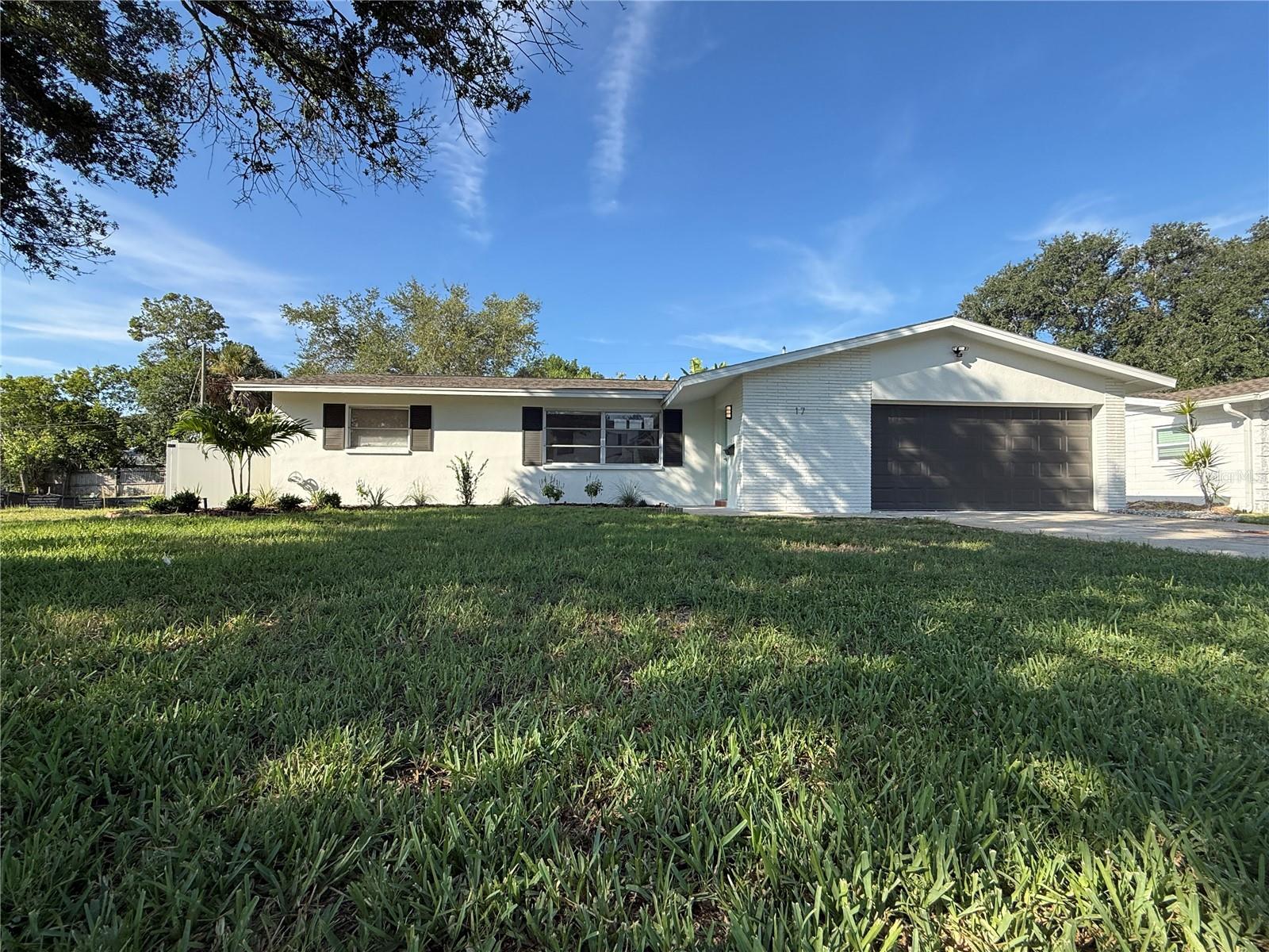 Be the first to enjoy this beautifully remodeled 3-bedroom, 2-bath pool home featuring an open-concept floor plan, designer finishes, and an incredible private backyard retreat.

The stunning kitchen offers custom wood cabinetry, quartz countertops, stainless steel appliances, a designer tile backsplash, abundant storage, and an oversized breakfast bar that opens to the spacious living and dining areas.

Both bathrooms have been completely renovated with upscale finishes, custom vanities, quartz counters, designer lighting, and beautifully tiled showers.

Step outside to your own tropical oasis featuring a beautiful private pool, screened lanai, fully fenced backyard, and mature landscaping, creating the perfect space for relaxing or entertaining year-round.

Additional features include: Two-car garage, Luxury wood-look tile flooring throughout, Recessed LED lighting, Ceiling fans, Laundry area, Large lot, Ample driveway parking.

Enjoy a golf cart-friendly community with a genuine sense of belonging,  think holiday golf cart parades, an annual boat parade, and neighbors who actually wave. You're just minutes from vibrant Downtown St. Pete's restaurants and shops, and the shimmering waters of Tampa Bay are practically at your doorstep. Stroll to a nearby park, hop on your bike and cruise through Snell Isle to Coffee Pot Park or historic Vinoy Park along the water, the lifestyle here is as rich as the home itself. Short drive to the beaches and Tampa International Airport. 

Pool services included. Pets considered with owner approval. Professionally Managed by Century 21 ListSmart, providing responsive communication and a streamlined leasing experience.
