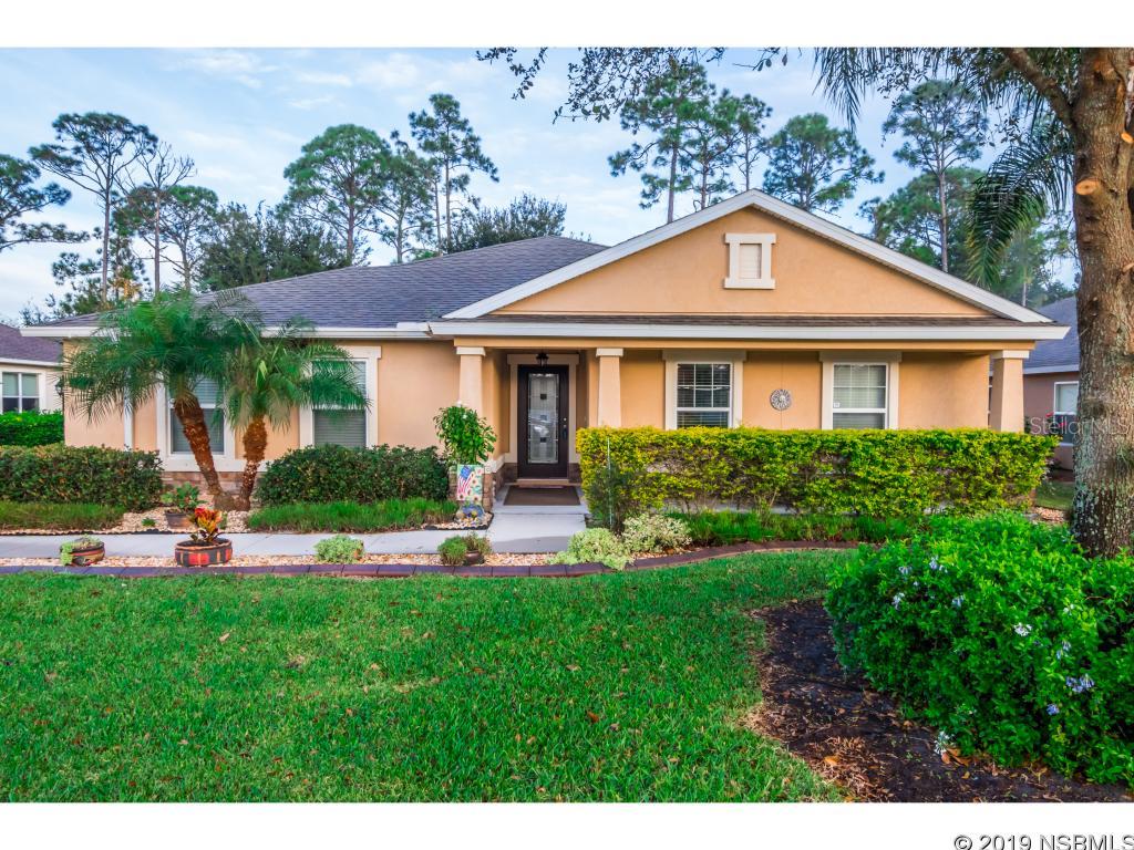 BEAUTIFUL MOVE IN READY HOME!  This Sugar Mill Gardens 4 bedroom 2 bath home built in 2011, offers 1847 living sq ft. This home features on the exterior meticulously maintained landscaping, a 2 car side entry garage, architectural shingles, ledge stone and stucco front, and a rear covered porch and pavers.  Inside you will find an open floor plan, recessed lighting, an upgraded kitchen with 42" upper cabinets, upgraded countertops, stainless steel appliances, and a tile backsplash.  Master suite offers a tray ceiling, dual vanities, separate garden tub and walk in shower.  Inside laundry!  New interior paint 2019.  Furniture negotiable.  Close to I-95, shopping, dining and the beach! ;Water: City