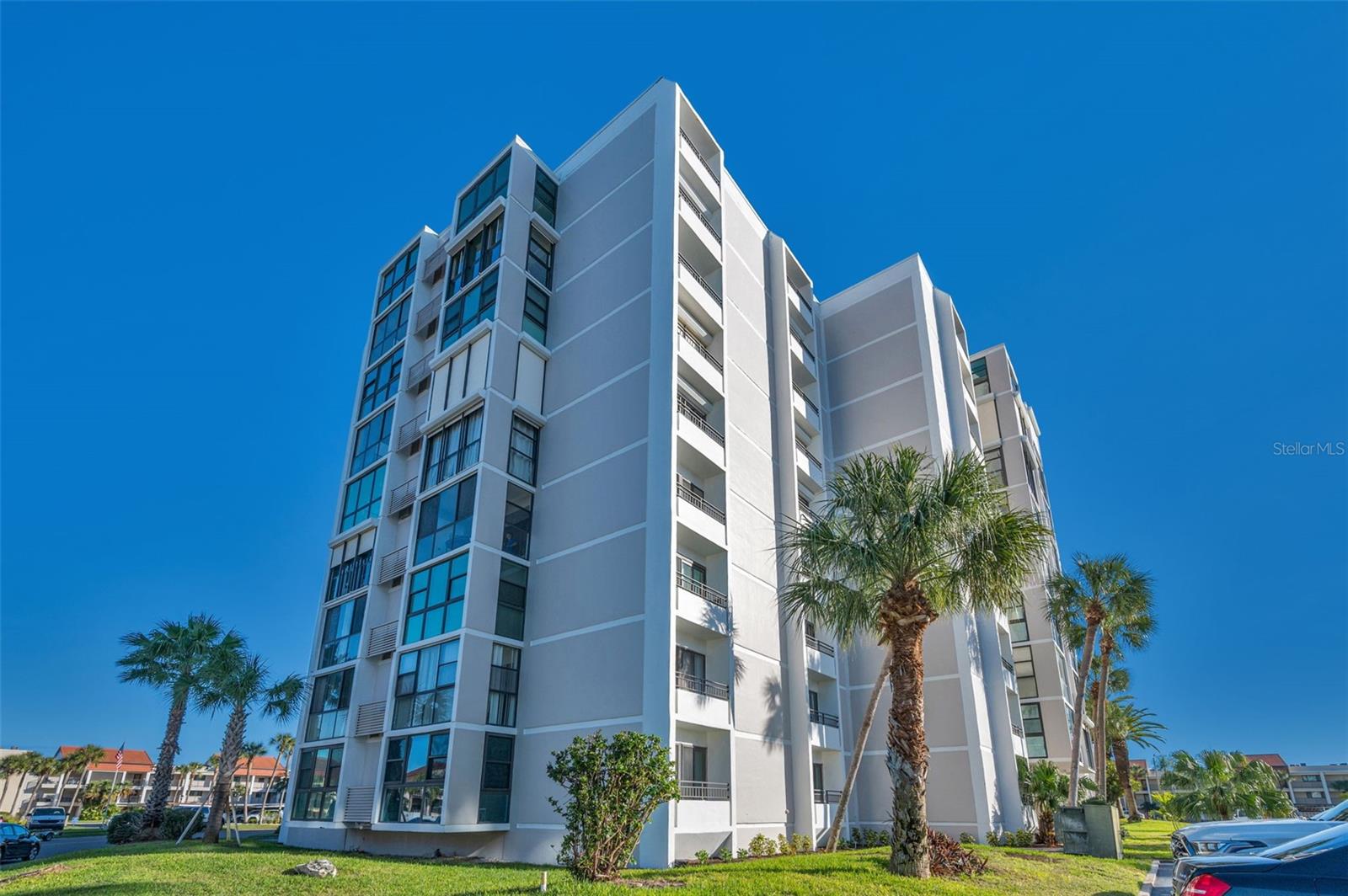 Experience elevated coastal living in the heart of Clearwater Beach with unobstructed water views from every window. This beautifully updated residence features an open-concept design filled with natural light, creating the perfect space for both relaxing and entertaining.
The modern updated kitchen is highlighted by a spacious breakfast bar and built-in beverage fridge, seamlessly flowing into the main living area. The private owner’s suite offers multiple closets and a stylish en suite bath for added comfort and convenience. Experience morning sun rises from your own bed! Additional features include a new stack washer and dryer, thoughtful upgrades throughout, and a layout designed to maximize the stunning waterfront scenery and includes furnishings. Located at the south end of Clearwater Beach, community features include 3 pools, heated spa, access to private beach, fire pit and picnic area and so much more! Watch the dolphins play and boats float by from every window. Enjoy the best of beachside living with contemporary finishes, breathtaking views, and a prime location just moments from dining, shopping, and the sugar sand beaches of Clearwater!