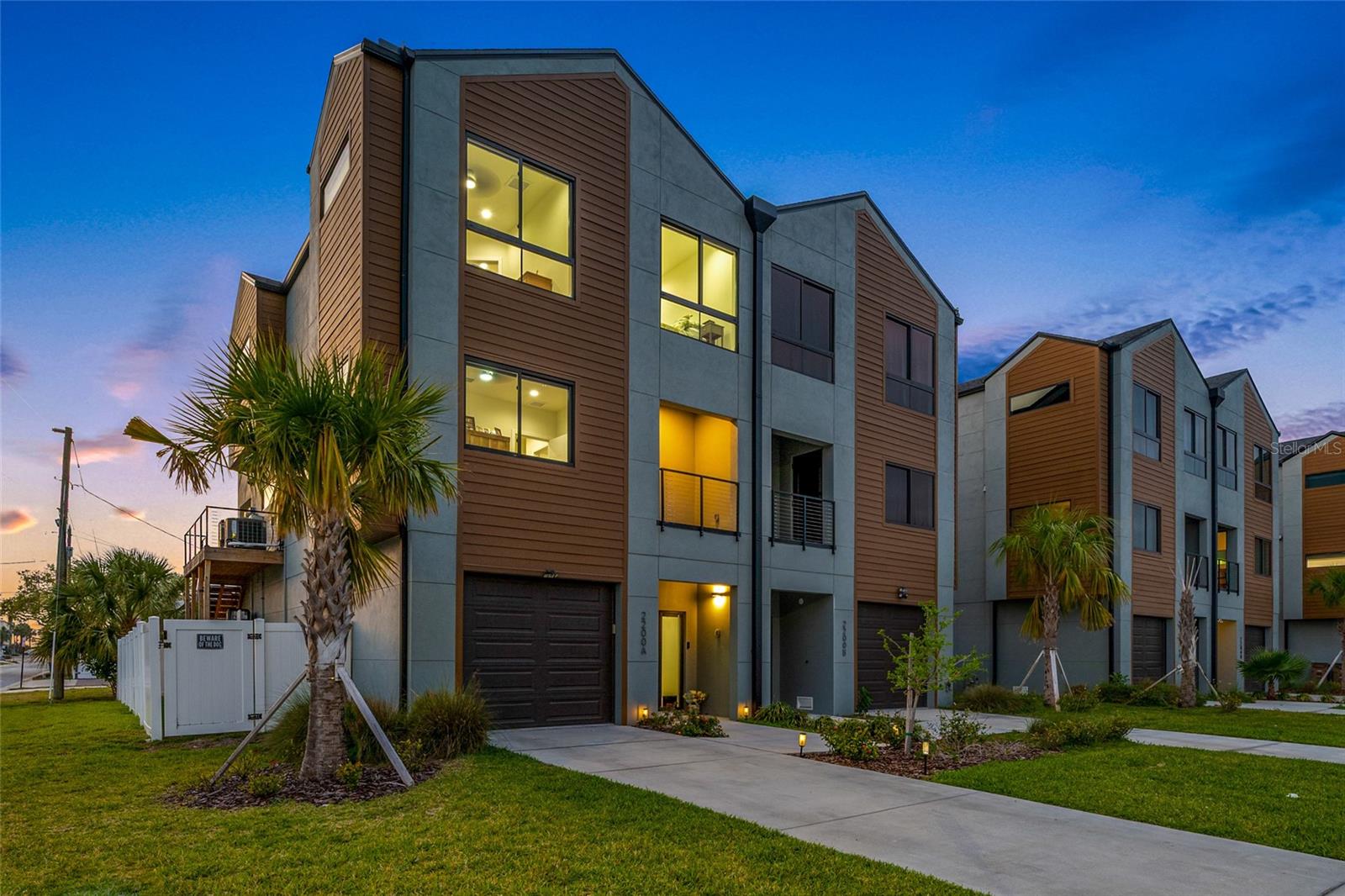 Come see why Indian Rocks Beach is the best kept secret in the area - the benefits of gorgeous beaches and sunsets, shops, restaurants and easy access to the Gulf or Intracoastal without the crowds, noise, and garbage.

This 2024 beautiful end unit townhome is perfectly positioned between the Gulf and the Intracoastal with views of both. It offers tons of light, big balconies, a 2 1/2-car garage, along with 4-bedrooms and 3-bathrooms.

The unit has an open concept layout with high ceilings and beautiful custom high-end finishes that make entertaining a delight. Ceiling fans and laminate floors throughout - no carpeting anywhere.

The indoor kitchen is a chef's dream with stainless appliances, marble/quartz counter tops, plenty of cabinets, pantry, and spectacular views while you prepare your meals. All floors can be accessed by a convenient elevator with phone.

The primary bedroom terrace provides beautiful sunsets and natural lighting with picturesque water views. The primary bathroom shower is dual-head and big enough for a party.

There is a private Pebble Tec in-ground pool with a water feature. All pool equipment and air conditioning units are elevated. The whole outdoor entertainment area has modern pavers and professional landscaping. There is a beautiful outdoor kitchen for grilling with friends and family.

Just picture yourself walking onto the terrace overlooking the backyard and gorgeous skies at sunset, or cruising the neighborhood in your golf cart, or zipping down the street to the beach (where plenty of parking spots are reserved for locals). Or you might stroll out to one of multiple restaurants or hop on the Beach Trolly South to St Pete or North to Clearwater. Or walk down the street to play tennis or pickleball at Kolb Park. Or go fishing in the Intracoastal or Gulf.

There are no rental restrictions so short-term and long-term rentals without stipulations are possible. Watch the sunrise over the intracoastal and sunset on the Gulf from your kitchen or balcony! Enjoy it year-round or as a vacation home that gives you income when you aren't there. Come check out Tesoro Del Mar