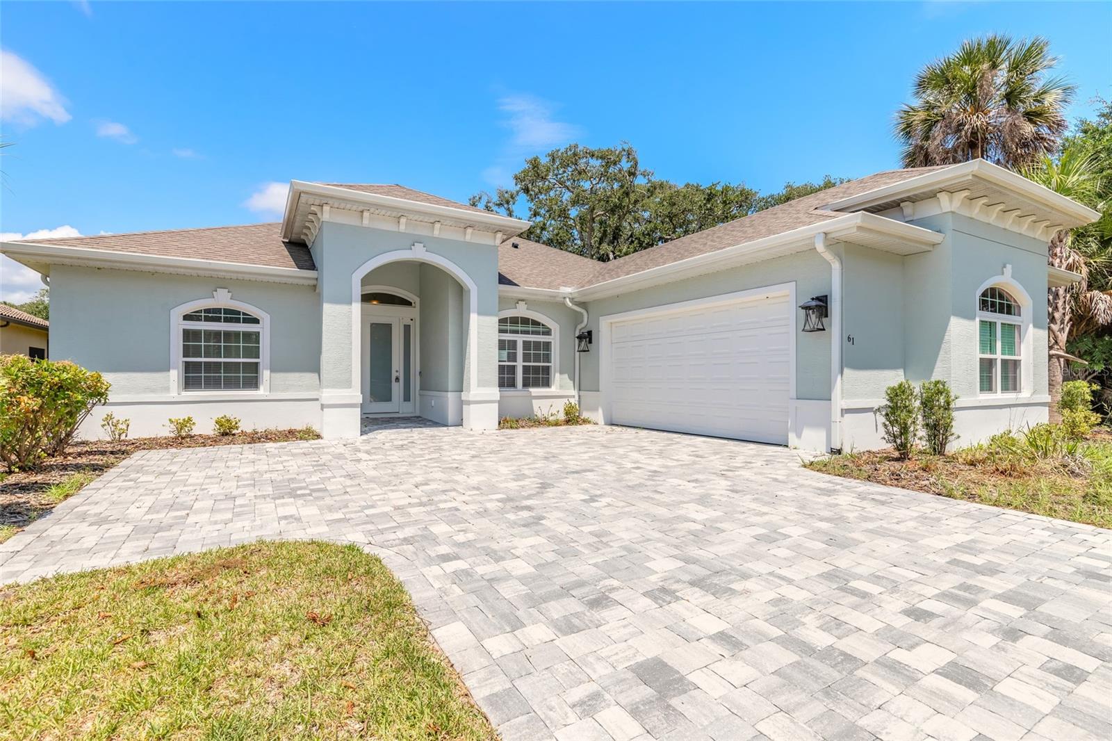 Located in the gated community of Palm Coast Plantation, this 2023 custom home offers 3 bedrooms, 2 bathrooms, a flex room, and 2,148 sq. ft. of living space, a screened covered lanai and a large 2 car garage. The home features an open floor plan with a great room with coffered ceilings, a gas fireplace, and sliders to the screened lanai overlooking the pond. The kitchen includes stainless appliances, a wine cooler, 42-inch cabinets, quartz countertops, a large breakfast bar, a breakfast nook, and separate dining room. The split-bedroom floor plan offers privacy with the primary suite on one side of the home, with two additional bedrooms and the flex room on the opposite side. Additional features include an interior laundry room with the washer and dryer plus an oversized 2-car garage with room for storage. Palm Coast Plantation resort style amenities include a community pool, tennis and pickleball courts, a fitness center, basketball court, a kayak launch on the lake, and fishing pier on the Intracoastal Waterway. The community is approximately 6 miles from Flagler Beach, with access to Palm Coast shopping, restaurants, and services. If you are looking for a turn-key home in a gated community this is one to get on your short list. This property is eligible under the Freddie Mac First Look Initiative through 8/6/2026.  Owner Occupants, non-profit and Neighborhood Stabilization Program offers will be considered FIRST LOOK.  Buyer to pay doc stamps. There are no warranties expressed or implied.  All measurements are approximate.  Sq. footage received from the tax rolls.  All information recorded in the MLS is intended to be accurate but can not be guaranteed.  Buyer should check zoning for rental restriction. There are no warranties expressed or implied.  All measurements are approximate.  Sq. footage received from the tax rolls.  All information recorded in the MLS is intended to be accurate but can not be guaranteed.  Buyer should verify HOA for rental restrictions.