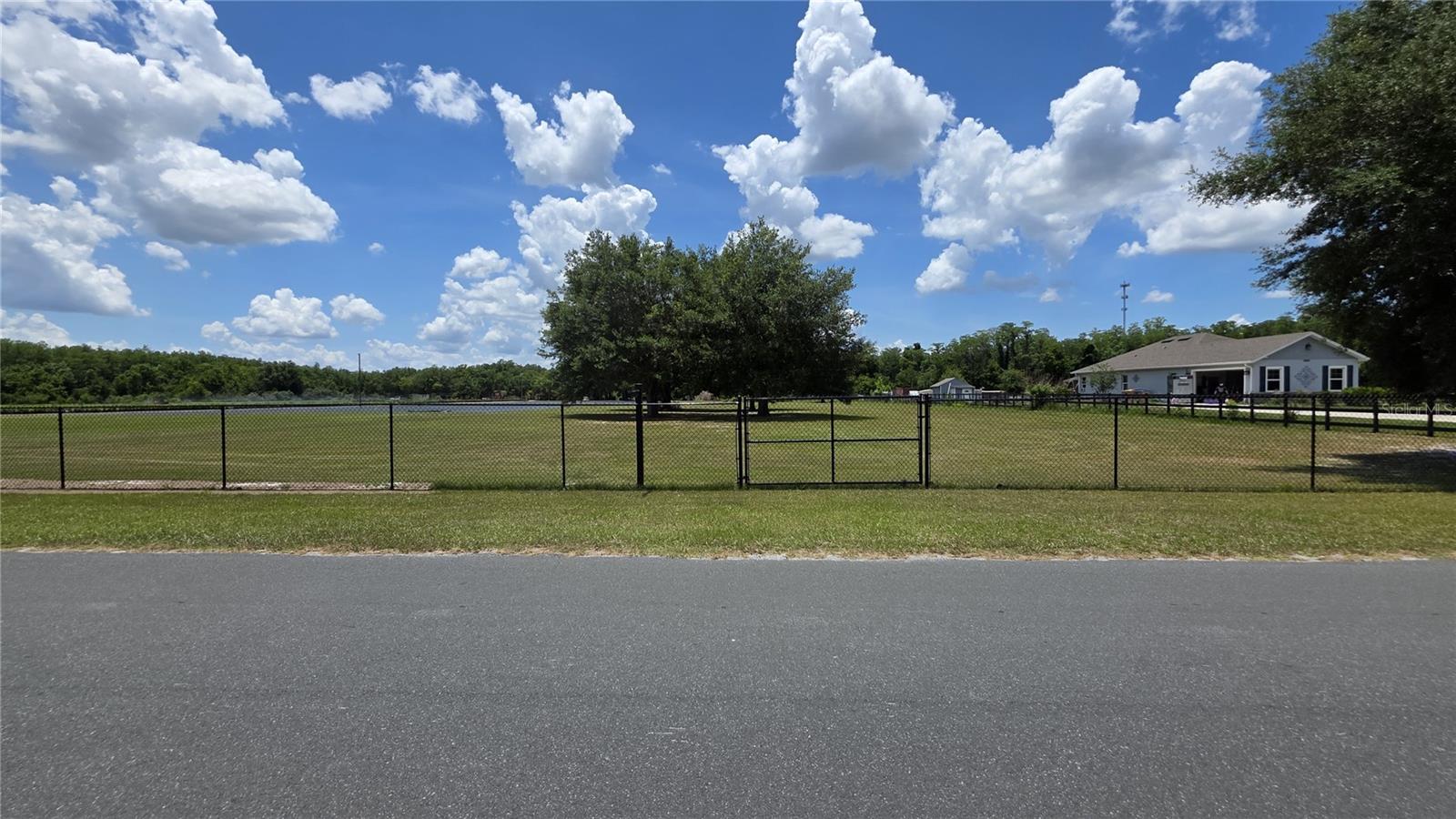 Discover the freedom and opportunity of nearly 5 acres in fast-growing St. Cloud, located in the desirable rural countryside of Osceola County. This expansive 4.9-acre homesite offers the perfect blend of privacy, open space, and future potential, all while remaining within reach of major roadways, shopping, dining, and Central Florida attractions.Whether you envision building a custom estate, private ranch retreat, barndominium, agricultural homestead, or simply securing land in one of Florida’s rapidly developing corridors, this property delivers endless possibilities. Bring your boats, RVs, equipment, toys, animals, and imagination. Wide open skies, natural surroundings, and room to breathe create the ideal setting for country living without sacrificing convenience.Enjoy the beauty of Old Florida while staying just a short drive from Lake Nona, Orlando, major employment centers, medical facilities, entertainment, and area airports. Opportunities for sizeable acreage in this location are becoming increasingly rare.Build now or invest for the future, the possibilities here are truly exceptional.