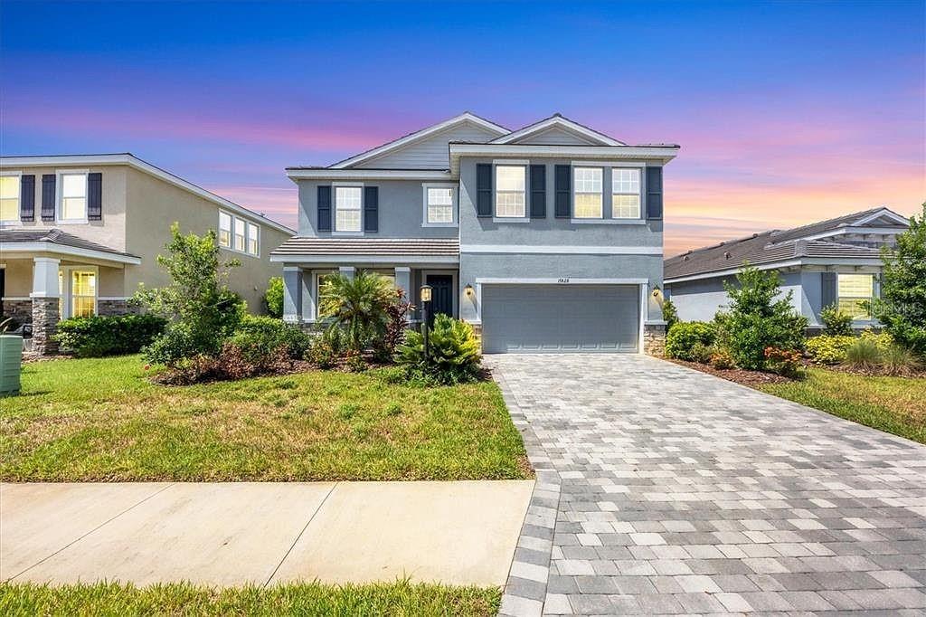 This nearly new, meticulously maintained home is nestled in a highly desirable community offering an exceptional lifestyle. The spacious and well-designed floor plan features a versatile main floor flex room, perfect for an office, dining room, or additional living space. The beautiful modern kitchen boasts a breakfast bar, ample cabinetry, opens to the dining area and great room—ideal for family gatherings and entertaining. The guest bedroom and full guest bathroom with a walk-in shower provide comfort and privacy for your winter visitors, retreating from the cold. Upstairs, you'll find a fantastic bonus room, perfect for a media or game room. The split floor plan includes two additional bedrooms, a full bathroom, and a large primary suite with generous space and walk-in-closet. Enjoy outdoor living on the covered patio with extended pavers, overlooking a fenced yard with water views—perfect for relaxing or entertaining. The two-stall garage features an EV charging station for added convenience. Residents have access to resort-style amenities, including courts for all major court sports, a resort pool and spa, a state-of-the-art fitness center, yoga studio, golf simulator, baseball diamond, playground, and more. Golf carts are permitted, and the community offers a coffee bar and market—all for low monthly fees. This exceptional home combines modern comfort, amazing community amenities, and a prime location. Set up a private tour and make it yours.