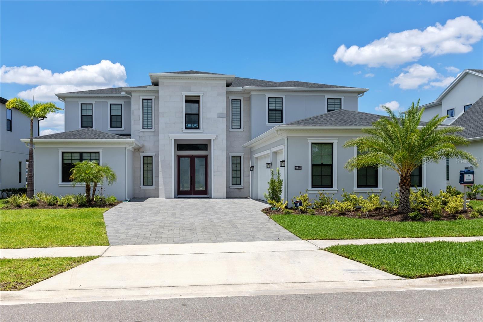 Now available as a fully furnished executive luxury lease in the prestigious gated community of Laurel Pointe at Lake Nona, this exceptional 2024 Toll Brothers Corbeil Palm Beach offers 6 bedrooms, 5 full baths, 1 half bath, 4,960 square feet of luxurious living space, tranquil pond frontage, an infinity-edge pool, panoramic screen enclosure, and a 3-car garage.

A grand double-door entry opens to a dramatic two-story foyer with a statement staircase, leading into an open-concept floor plan designed for both elegant entertaining and everyday comfort. The spacious great room features coffered ceilings, expansive sliding glass doors, and seamless flow into the dining area and gourmet kitchen. The chef’s kitchen is appointed with premium appliances, an oversized island, custom cabinetry, stone countertops, a walk-in pantry, butler’s pantry, and a coffee bar.

A private, fully furnished executive office with custom built-ins creates the perfect work-from-home environment, while the dedicated home gym includes an installed Tonal smart fitness system.

The home features two primary-sized suites, offering exceptional flexibility for executives, extended family, or long-term guests. The main-level owner’s retreat includes tray ceilings, dual custom walk-in closets, and a spa-inspired bath with a freestanding soaking tub, oversized shower, dual vanities, and private water closet. Upstairs, a spacious loft is surrounded by generously sized secondary bedrooms with walk-in closets and well-appointed bathrooms.

Outdoor living rivals a private luxury resort. The covered lanai includes a full outdoor summer kitchen overlooking the heated saltwater infinity-edge pool with a panoramic screen enclosure and peaceful water views. A walk-down tanning ledge with built-in seating invites relaxation, while the integrated underwater sound system lets you enjoy music both poolside and beneath the water. Professionally designed landscaping with an outdoor lighting system enhances the property’s beauty day and night.

Offered completely turnkey, the home is furnished with high-end designer furniture throughout, including premium outdoor patio furnishings. The lease includes lawn maintenance, professional pest control, and whole-home water purification system maintenance for effortless executive living.

Located in one of Lake Nona’s most sought-after luxury communities, Laurel Pointe offers convenient access to Medical City, Nemours Children’s Hospital, the VA Medical Center, UCF Lake Nona Hospital, the USTA National Campus, Lake Nona Town Center, Orlando International Airport, SR 417, and SR 528.

This rare executive lease combines luxury design, resort-style amenities, designer furnishings, and an unbeatable Lake Nona location, offering a turnkey lifestyle unlike anything else currently available.
