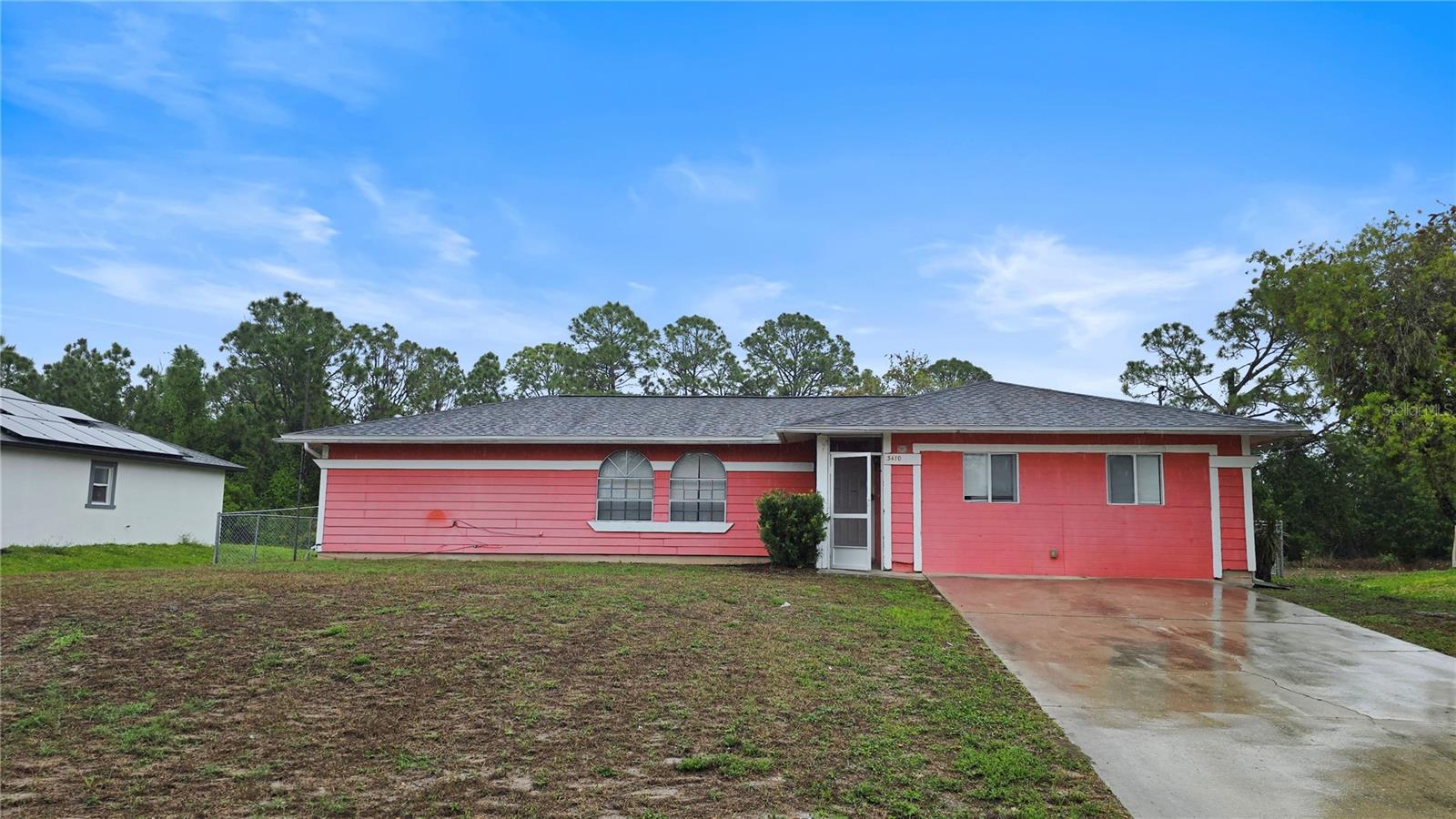Tucked away on a quiet street you will find your way to this exceptional opportunity to own your home and build some equity. Lehigh Acres is just minutes from Fort Myers and everything it has to offer. A fenced back yard with screen porch is the perfect evening destination. The shed would be an excellent workshop if you want to start on some projects. The patio with fire pit is a fantastic spot to end your day. Roast some marshmallows and look for shooting stars. Inside, you'll find a cool, comfortable floorplan with white trim and LVP flooring. A charming kitchen with breakfast bar, loads of counter space and an oversized farm sink will soon have you looking forward to meal prep. This 90's built home offers 3 bedrooms, 2 bathrooms, 2 stall garage and nearly outstanding potential to bring your favorite ideas to life. This home has been virtually staged for your enjoyment. Bathroom ceiling has been repaired.