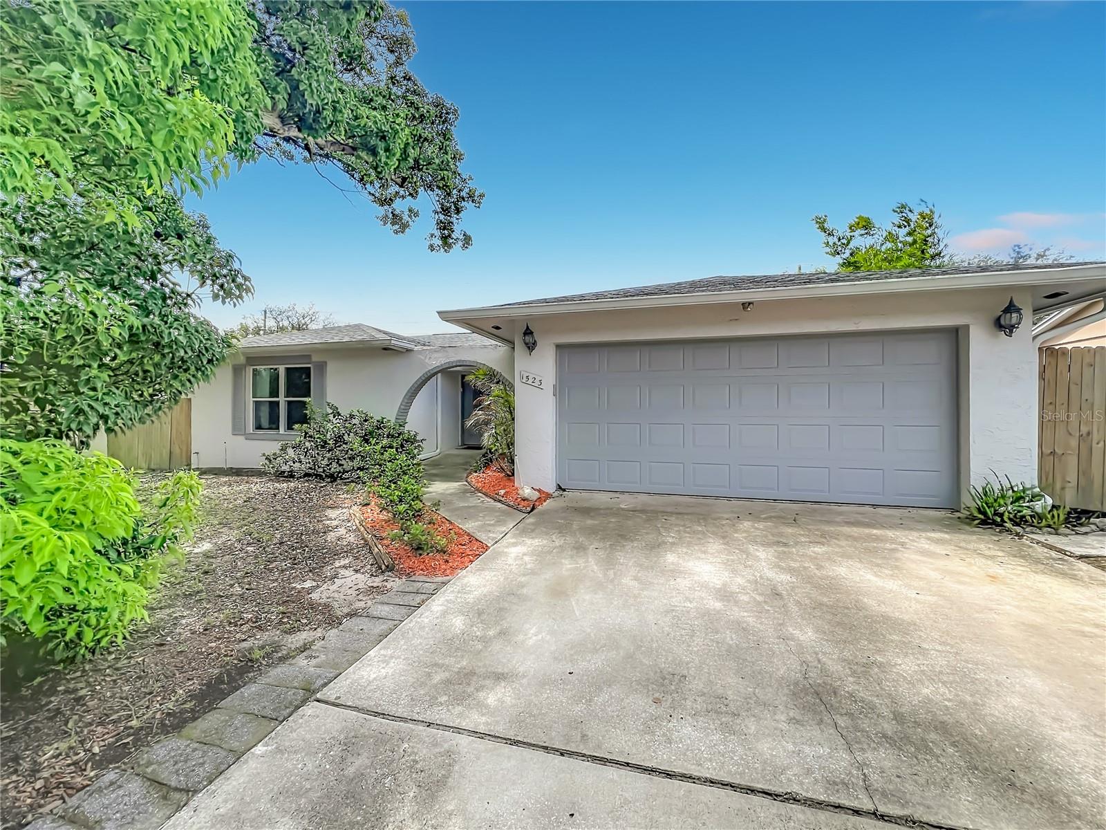 This beautifully updated, move-in-ready 3-bedroom, 2-bathroom pool home offers 1,596 square feet of perfectly designed single-level living space—all with NO HOA. From the moment you step inside, you are greeted by striking high ceilings and an abundance of natural light. The gorgeous, open eat-in kitchen is a chef’s delight, featuring bright white shaker cabinetry with soft-close hinges, quartz countertops, a timeless hexagon tile backsplash, and a full stainless-steel appliance package. Durable, waterproof luxury plank vinyl flooring runs seamlessly throughout the house and extends right out to the backyard.  The split floor plan ensures maximum privacy. Retreat to the spacious primary suite, complete with a generous walk-in closet and a completely modernized ensuite bathroom. Guests will love the second bathroom, which boasts an updated real-wood vanity, quartz countertops, and a custom step-down Roman tub.  Step through the rear doors to discover the ultimate Florida outdoor lifestyle. The enormous, fully covered and screened-in back porch serves as a true extension of your indoor living area, overlooking your own sparkling private swimming pool. It’s the perfect setting for weekend barbecues, morning coffee, or unwinding in the evening. Roof was replaced in 2020, New AC in 2020, All new Duct work in 2023, New Water Heater in 2020, New Electrical panel in 2020, New Windows in 2020, New Garage door in 2020, Upgraded Kitchen in 2020, Bathrooms upgraded in 2020New pool pump and pool resurfaced in 2020, New Garage door in 2020, Property has Fibre Cable for internet.