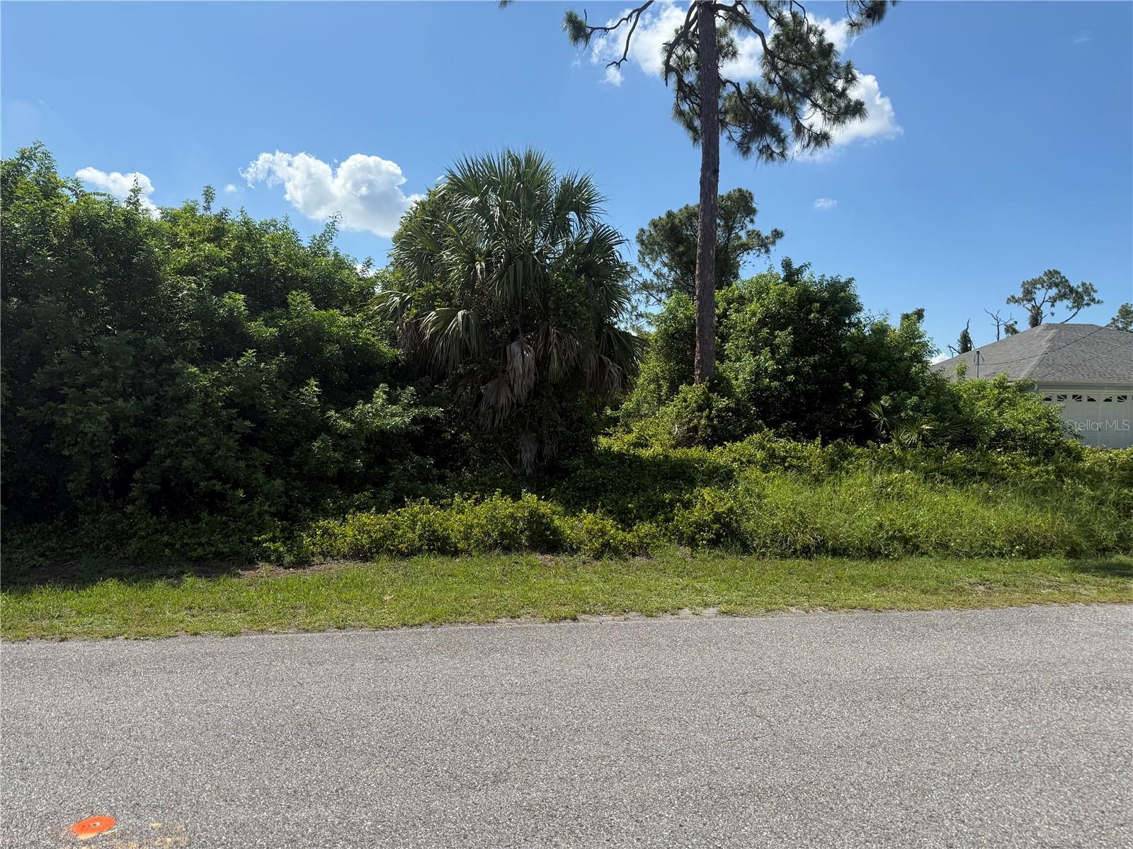The search for the perfect homesite ends here! This oversized corner lot offers the ideal canvas to bring your Florida dream home to life. Situated in an X flood zone, you'll enjoy added peace of mind while designing the home you've always envisioned.

Whether you're planning your forever home, a seasonal retreat, or an investment property, this spacious parcel provides extra flexibility thanks to its generous size and desirable corner location. With additional frontage and layout possibilities, you'll have plenty of room to create the outdoor oasis you've always wanted.

Conveniently located near the border of North Port and Port Charlotte, you'll enjoy easy access to shopping, dining, medical facilities, golf courses, parks, and everyday conveniences. Spend your weekends exploring nearby Gulf beaches, boating, fishing, spring training baseball, or discovering everything Southwest Florida has to offer.

Don't miss this opportunity to secure a well-located, oversized lot in one of the area's fastest-growing communities. Bring your builder, your plans, and your vision—your next chapter starts here!
