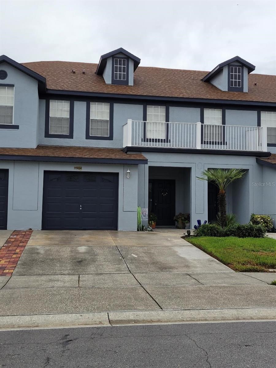 Gorgeous 3 Bedroom, 2.5 Baths, 1 car garage, (2,013 sq. ft.) Townhome located in gated community of Town Homes of Flora Ridge. Great open floor plan on first floor that includes large living and dining area, kitchen ( wood cabinets and Granite countertops), garage, large sliding glass doors to patio, half bath, and a built in study work space.  Up stairs has spacious Primary Bedroom with Trey ceiling, his and her closets, and bathroom with Shower and Jacuzzi  tub.  Down the hall is the washer and dryer along with 2nd and 3rd bedrooms.  Within the community you can enjoy the play area, the fountain, the lake, a walking path. and the community pool with cabana.  Located close to major attractions, major highways, and shopping centers. Home is minutes away from The Loop, Movie Cinemas, many restaurants, and stores. Close to the major theme parks Disney, Universal, Seaworld, and Airport. Great location that is very convenient.