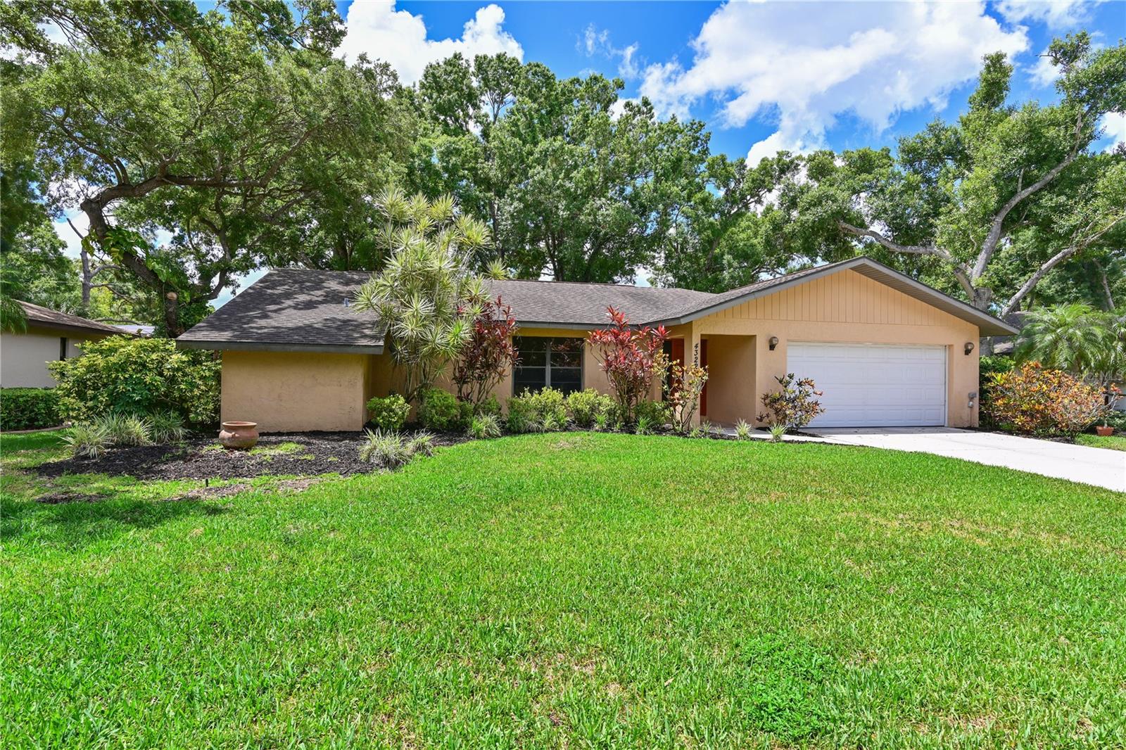 Fabulous highly desirable location west of 75 and in top notch school district! This is a very spacious home, loved by the original owner and very well maintained. Very comfortable great room and separate formal living - additional space for privacy and relaxation. Three oversized bedrooms, two bedrooms of which are located at the rear of the property and with easy pocket door, can be closed off to main area of home. Separate interior laundry room with mud sink. Spacious kitchen with lots of cabinets and plenty of counter space, overlooking dining area and beautiful park like view. Owner upgraded and added on a 31x16 covered and screened lanai in the rear of the home. Lovely cul-de-sac location, perfect for little ones learning to ride their first bicycles out of busy traffic. Literally two minutes to grocery stores, multiple choices for dining nearby and a mere 5 miles to downtown Sarasota and 6 miles to the beautiful sugar sand beaches of Siesta Key. It's tough to beat this location - so get in now and make the home yours. Located within the Wilkinson, Sarasota Middle and Riverview High boundaries - and Pine View School for the Gifted.