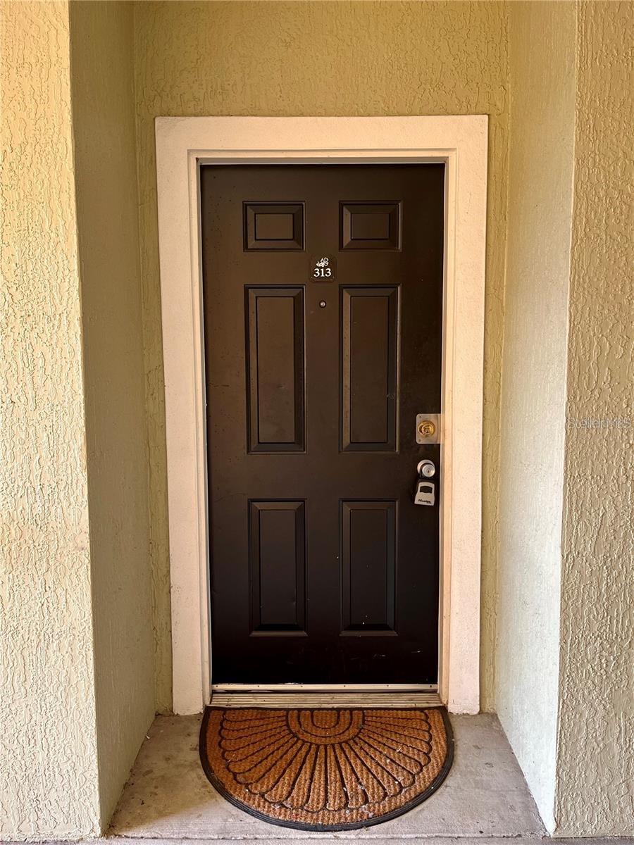 The Hamptons at MetroWest  is one of the highly desired gated community in  Orlando. Beautiful and spacious 1-bedroom, 1-bathroom unit located on the third floor in a well-maintained and desirable community.  The renovated kitchen is equipped with stainless steel appliances, and the unit includes in-unit laundry for your convenience. Enjoy the serene surroundings with lush green areas and a beautiful lake within the community, as well as access to a sparkling pool. One assigned parking space included. A perfect place to call home!