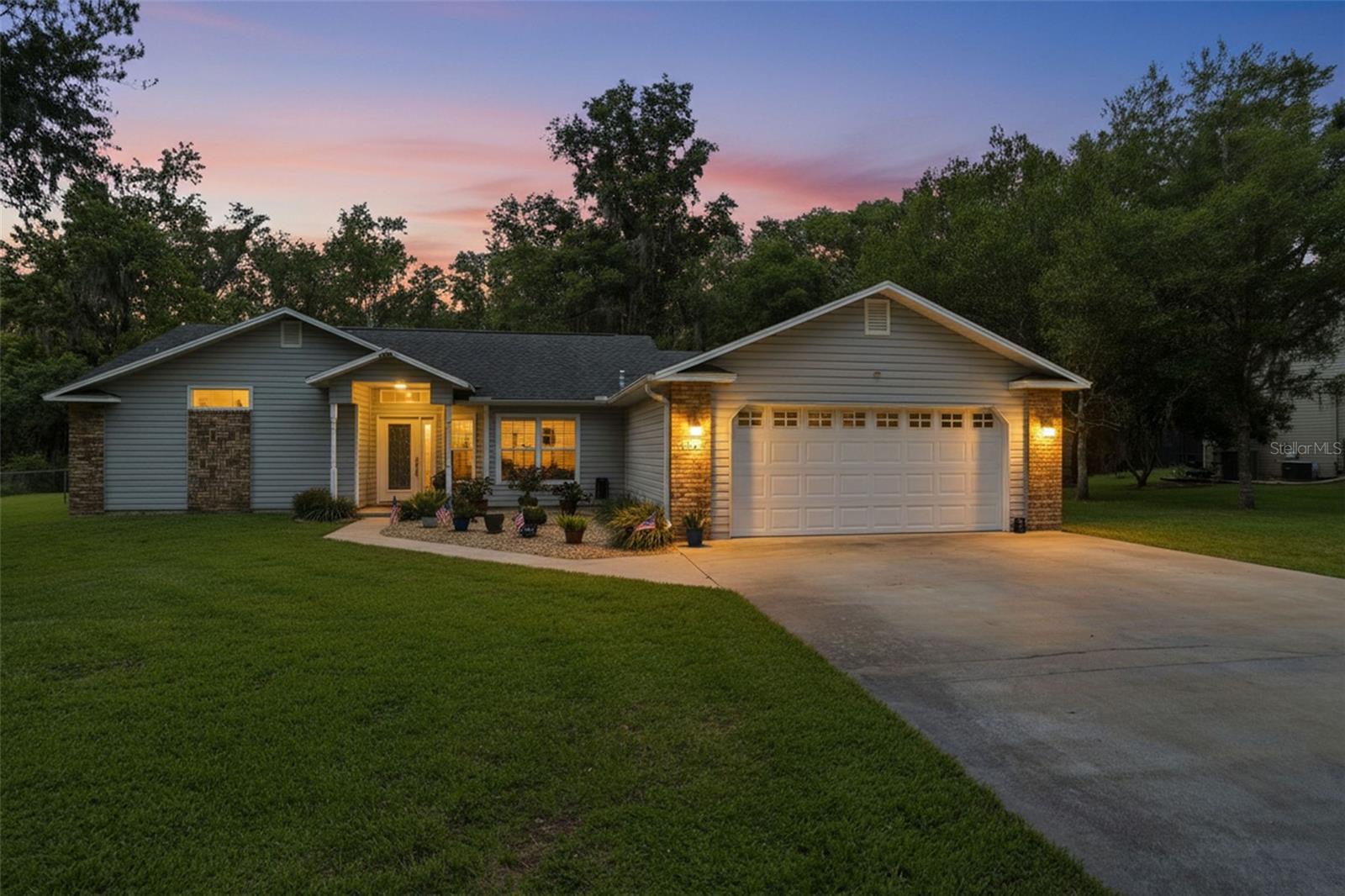 Welcome to this picture-perfect home in the heart of Brooksville, meticulously maintained and move-in ready! Step inside to an open and inviting great room featuring soaring vaulted ceilings that extend through the living area, kitchen, and primary bedroom, creating a spacious and airy feel throughout.
The updated kitchen boasts beautiful granite countertops, offering both style and functionality. Recent improvements include impact-resistant windows and doors and new carpet installed in February 2026, and plantation shutters on.
The living room overlooks a stunning heated saltwater pool surrounded by pavers and a screened lanai, providing the perfect setting for relaxing or entertaining guests year-round.
The spacious primary suite features a large garden tub, separate walk-in shower, and plenty of room to unwind. Outside, the fully fenced backyard offers privacy and versatility, complete with a 10' x 8' storage shed and a dedicated gravel pad for RV or boat parking.
Additional highlights include an exterior outlet for whole-home generator hookup for added peace of mind. Combining thoughtful updates, outdoor amenities, and exceptional care, this home truly has it all!