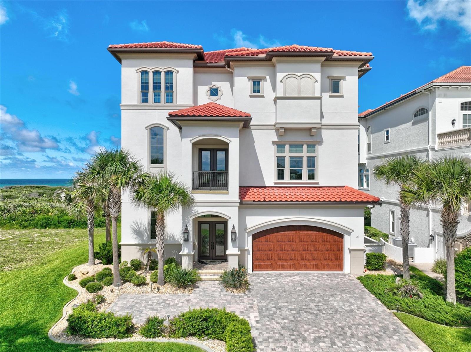 Introducing a stunning oceanfront home nestled within the exclusive Ocean Hammock gated community. This exquisite residence boasts breathtaking views of the Atlantic Ocean and pristine beaches, offering a perfect blend of luxury and tranquility.
Over 5000 square feet of meticulously designed living space, the home features unparalleled craftsmanship and elegant architectural details. The third-floor main living area is designed to maximize panoramic ocean views, providing a serene and picturesque setting for relaxation and entertainment.
 The home includes an elevator for easy access to all levels, a private beach walkover for direct beach access, and a private pool complete with a poolside kitchen, living room, and pass-through window for added convenience. A full bathroom is accessible from the pool area, enhancing the outdoor living experience.

For ultimate comfort, the home is equipped with a state-of-the-art Control 4 audiovisual system and an advanced security system, ensuring both entertainment and peace of mind. Practical features include two laundry rooms located on the second and third levels, adding to the home's functionality.

Every detail of this magnificent oceanfront home has been crafted to create an unparalleled living experience. Whether enjoying the private pool, entertaining in the outdoor living areas, or simply relaxing to the sound of waves, this residence offers the ultimate in luxury and comfort.  https://see.virtualopen.house/v/fQY4nJc