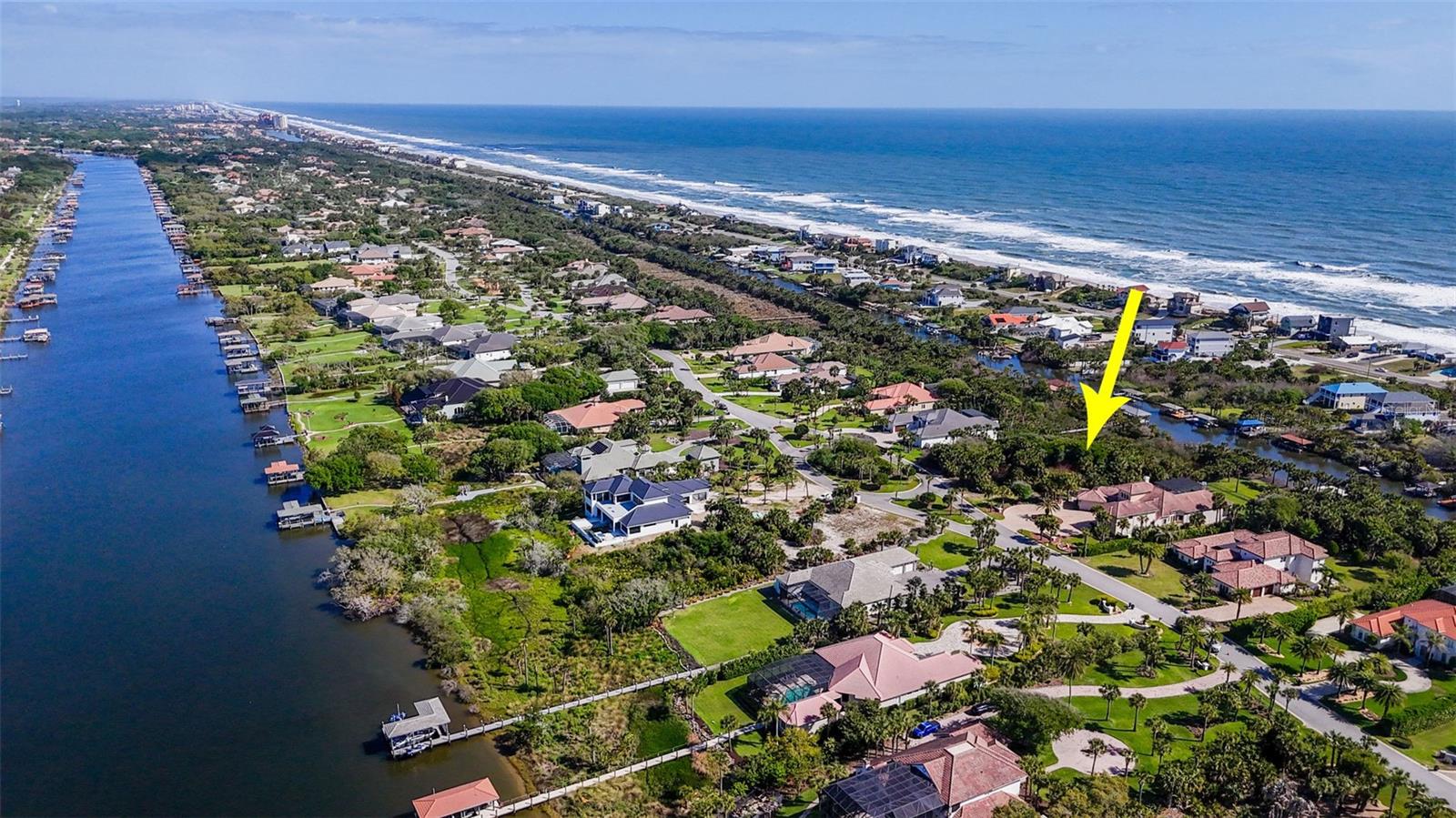 Your private enclave awaits. Presenting a rare opportunity to build a custom waterfront estate within the exclusive, guard-gated enclave of Hammock Beach Island Estates in Palm Coast. This exceptional homesite boasts approximately 140 feet of pristine canal frontage, offering a serene and private backdrop for an elegant coastal residence. Designed for the discerning buyer, this property provides direct, bridge-free access to the Intracoastal Waterway—a true boater’s dream with seamless navigation to open waters. Whether envisioning a private dock, luxury yacht access, or sunset cruises from your backyard, the possibilities are unparalleled. Nestled along a private paved road behind 24/7 guard-gated security, this intimate community ensures the utmost privacy and exclusivity. Surrounded by distinguished estates and lush coastal landscapes, the setting is both tranquil and refined. Perfectly positioned just moments from scenic Florida State Road A1A, you’ll enjoy convenient access to nearby pristine Atlantic beaches—ideal for morning walks, sunrises, and the quintessential Florida coastal lifestyle. Residents enjoy proximity to the world-class amenities of Hammock Beach Golf Resort & Spa, including two championship golf courses, an oceanfront clubhouse with multiple dining venues, fitness center, oceanside pool, tennis, pickleball, bocce, and a full calendar of social events. With no mandatory build time, you can secure this premier property now and build at your own pace. This is more than a homesite—it is a canvas for a legacy property in one of Florida’s most coveted coastal communities. A truly rare offering where luxury, security, and effortless waterfront living converge.