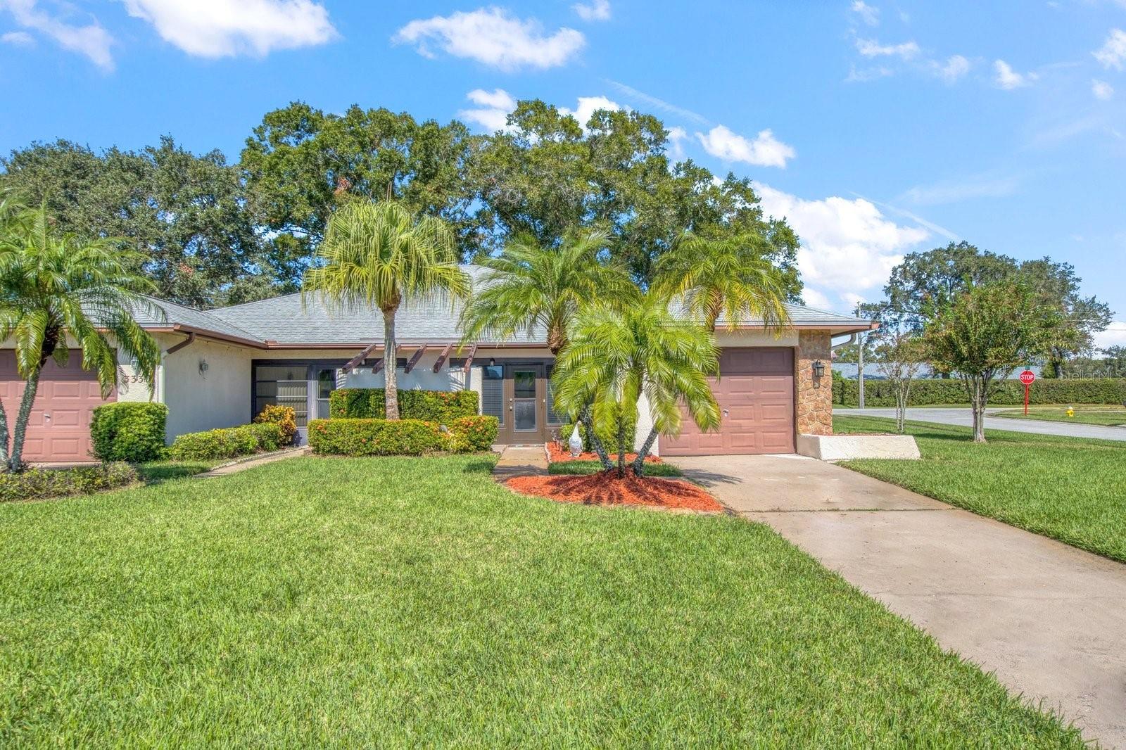 Welcome 3337 Gorse Court! This charming half duplex on a large corner lot offers a wonderful opportunity to own a cozy and updated property in a most desirable community in Highland Lakes of Palm Harbor. As you approach the front entrance, you'll be greeted by a lovely patio, perfect for enjoying your morning coffee or relaxing in the evening. This outdoor space allows you to create your own oasis and enjoy the fresh air. Inside, you'll find several updates that enhance both the aesthetic appeal and functionality of the home. The windows have been recently updated. The kitchen has also been renovated with modern finishes, making it a delightful space for cooking and entertaining. The flooring has been upgraded throughout the house, adding a touch of elegance and comfort to every room. In addition to these updates, the property also features a new electric panel, a newer water heater, and HVAC system just 7 years. A 4 Point Inspection was just completed and the inspection report may be transferred to the buyer for homeowner insurance. Duplex Village II is pet friendly and you are allowed to have a dog here. Highland Lakes offers amazing amenities and value in the best possible location of Tampa Bay! Residents enjoy free golf on 3 private executive courses and free RV or boat storage. There are tennis and pickleball leagues and beginner clinics. There is a club for virtually every interest or hobby and lots of games groups. The main clubhouse & Lake Lodge are the venues for many entertainment and social events and fitness classes. The Arts and Crafts building has a wood shop, art studios and classes. Enjoy quality of life benefits of living within minutes of world-class Gulf beaches, great restaurants & shopping, exciting pro sports, rich cultural resources, two international airports, and highly respected medical services in a near-perfect climate safely above the flood plain in a non-evacuation zone. The best of Florida's lifestyle is waiting for you!