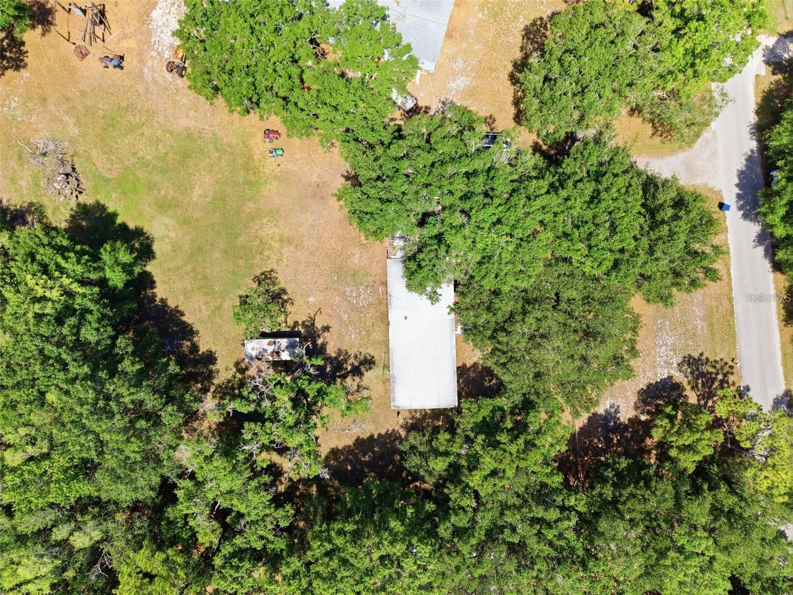 Discover the perfect opportunity to build your dream home in a highly desirable and convenient location! The value is in the land, offering endless potential for those seeking space, privacy, and flexibility. Zoned Residential/Agricultural, this property is ideal for a custom home with room for livestock, gardening, and other agricultural uses. For buyers seeking additional acreage, the adjacent parcel located at 1136 Wildwood Lane is also available and may be purchased together as a package, creating approximately 2 acres of combined land. Location is everything, and this property delivers! Situated just minutes from State Road 54, you'll enjoy quick access to Publix, shopping, dining, gas stations, and everyday conveniences. The Suncoast Parkway is also nearby, providing an easy commute to Tampa and surrounding areas. Whether you're looking to build now or invest for the future, this property offers a rare combination of acreage, flexibility, and an unbeatable location.