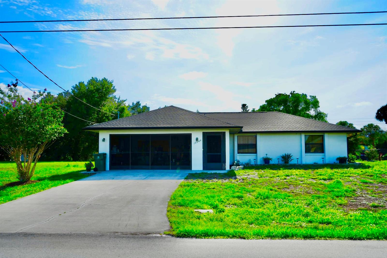 Welcome home to this beautiful, move in ready, 3 bedroom, 2 bath home situated on the March Waterway in Englewood, Florida in a NO FLOOD ZONE. Built in 1986, this home has had recent improvements that include luxury vinyl flooring in bedrooms, living room and dining area, HVAC system, water heater, shingled roof, lanai roof, gutters, painted interior and exterior, hurricane windows, hurricane protection on patio door, entry door and garage door.
Custom, additional pantry/storage area, workbench and storage in garage.
There is irrigation set up for lawn, but main feed line damaged in past storm and has not been fixed or replace and not functioning. Room to build a dock to fish from or launch your kayaks or canoes! With this prime location, updated features, and serene waterway setting, this home offers the perfect blend of comfort, value, and Florida living! Come see this home TODAY!