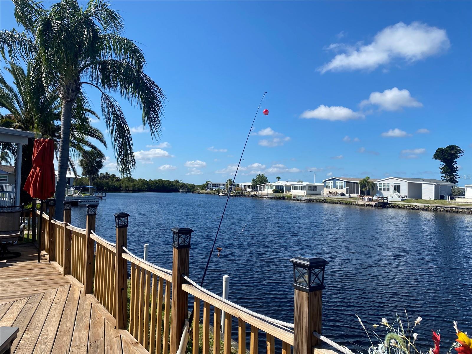 Welcome to Paradise!! Harbor Cove is a premier 55+ WATERFRONT manufactured home community in Sarasota County! The BEST amenities, clubs, and selection of activities you will find in any community. Harbor Cove is located on the banks of the beautiful Myakka River. No need to worry about updates, this 2 bed, 2 bath home has already been improved. Light, bright, and airy, this well-maintained home makes every day feel like you're on vacation. Serene water views provide a backdrop of peace and natural-living. You can live the quintessential Florida lifestyle as soon as the ink dries on the closing papers! This home is the perfect seasonal place to enjoy Florida's coveted gorgeous winters and a perfect year-round home for those who love all 4 seasons of Florida. If you enjoy an abundance of activities, you will have plenty to choose from in Harbor Cove: Pickleball, tennis, shuffleboard, bocce ball, card clubs, water aerobics, boating, and so much more. There are other amenities for an extra fee, such as a fitness center and wood working shop. One of the things that makes Harbor Cove so great is its proximity to...well...everything! Be prepared to enjoy Florida's wildlife at its finest, both inside Harbor Cove complex and at abundant state parks and nature preserves. Shopping and dining surround you in all directions. The spring training homes of both the Atlanta Braves & the Tampa Bay Rays are just a minutes away. The world-renowned Gulf beaches are all within 30 minutes or less! 1) Englewood beach, 2) Casperson Beach (GREAT for shelling), 3) Venice Beach (shark tooth capital of the world), 4) Brohard Paw Park, 5) Nokomis beach (you've GOT to experience the weekly drum circles), 6) the island gem of southwest Florida: Boca Grande... And finally: 7) Siesta Key in Sarasota has been ranked multiple times as the number one beach in the nation and is a mere 35 minutes away. Harbor Cove offers a lifestyle that every retiree dreams of. You have the quaint downtowns of Venice and Punta Gorda--both cities are often ranked as Top 10 destinations in the country for retirement. Another local favorite, Englewood, is a cozy, fun beach town on the Gulf. The residents of Harbor Cove agree: Harbor Cove is a community that offers it all. Don't miss your chance to see this home!