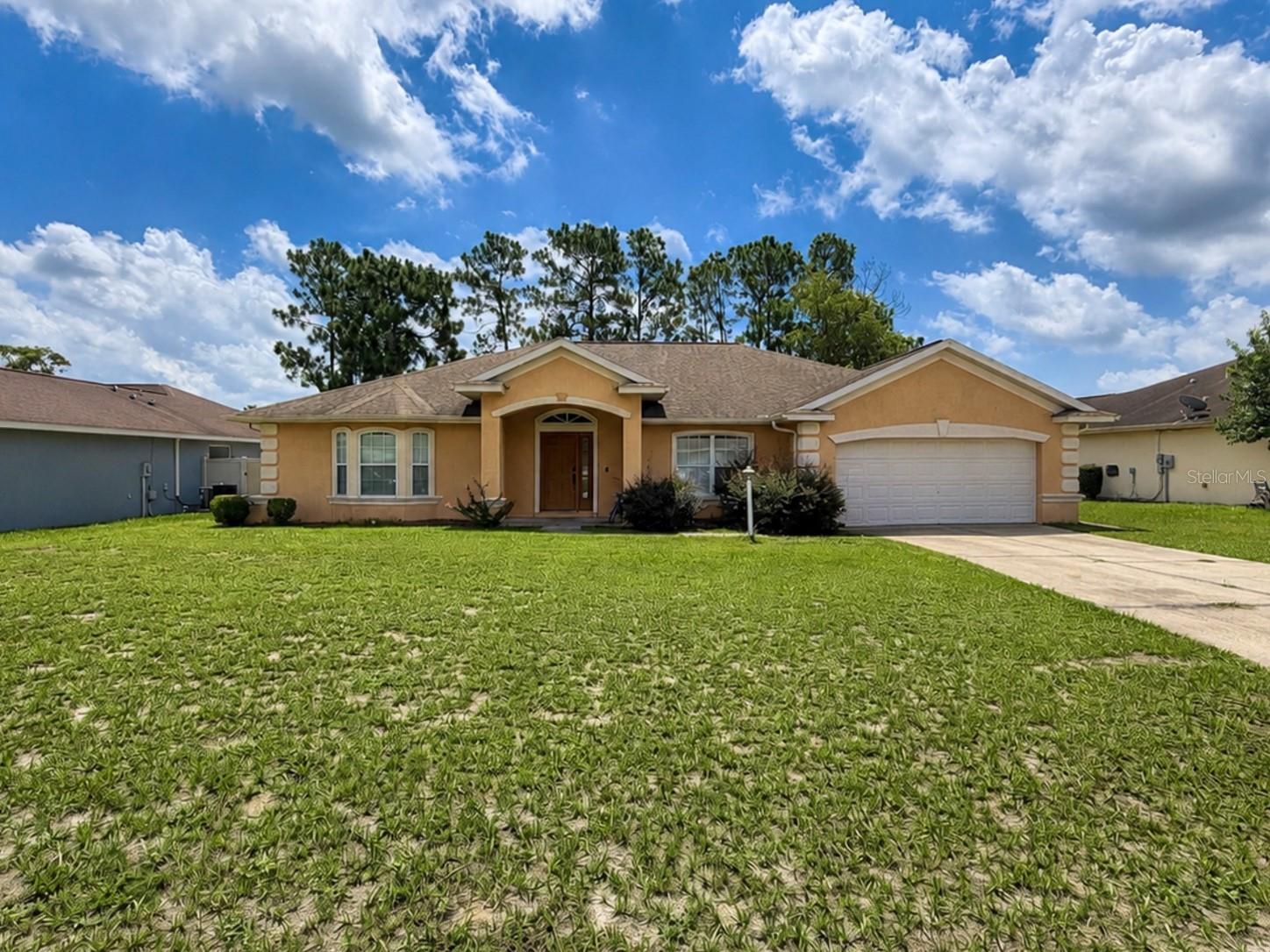 SELLER IS MOTIVATED—MAKE AN OFFER! Conveniently located just minutes from the Turnpike, this spacious 3-bedroom, 2-bath home in the quiet Timberwalk neighborhood sits on nearly a quarter-acre lot and offers 2,181 sq. ft. of living space. The oversized primary suite features a garden tub and separate shower. Recent updates include a newer A/C and tankless water heater. A recent 4-point inspection indicates the roof is in great condition, providing added peace of mind. Enjoy a peaceful country feel while remaining close to shopping, dining, and entertainment. Located approximately 30 minutes from Rainbow Springs State Park and just over an hour from Orlando’s world-famous theme parks. Bring your vision and personal touches to make this home your own. SELLER IS MOTIVATED—BRING YOUR BEST OFFER!