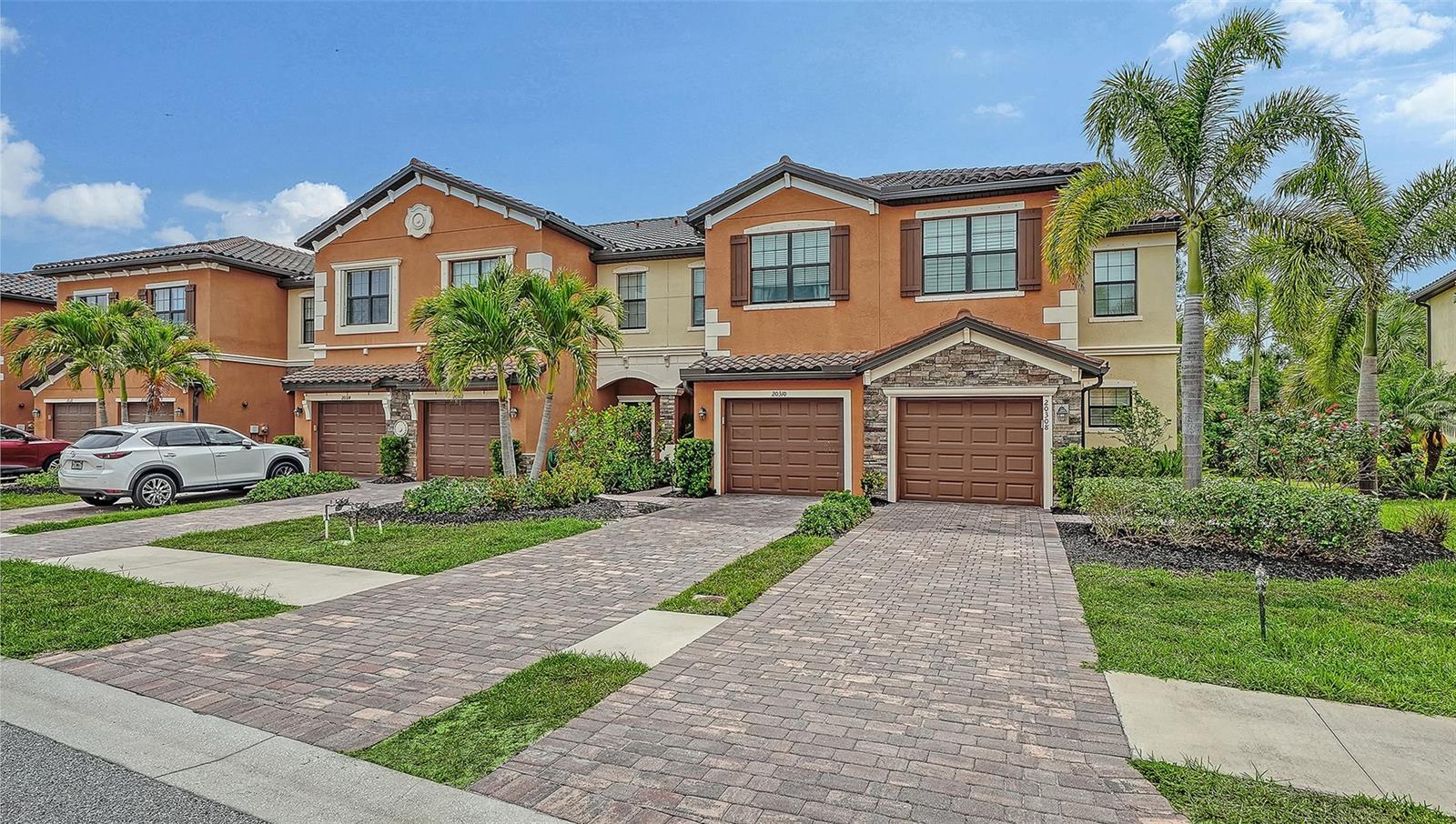 Opulent Townhome Living in Gran Paradiso — Luxury, Lifestyle & Minutes from Wellen Park
Welcome to Gran Paradiso, a premier Tuscan-inspired, resort-style community in the heart of Venice, where luxury living blends effortlessly with the vibrant Southwest Florida lifestyle. This impeccably maintained 2020 Berkley Model townhome offers 3 bedrooms, 2.5 baths, and showcases beautifully curated interiors. While furnishings are not included, they may be purchased separately, allowing a new owner the opportunity to move in with ease and enjoy a truly seamless, turnkey experience.

Step inside to an expansive open-concept living space, filled with natural light and elevated by high ceilings, crown molding, and designer finishes throughout. The home features tile and laminate flooring, modern vanities, stylish lighting, abundant storage, and thoughtful touches in every corner. The elegant living and dining area flows effortlessly to the covered, screened lanai, your private oasis for morning coffee, evening gatherings, or peaceful moments surrounded by lush Florida beauty.

The chef-inspired kitchen is a standout, offering solid wood cabinetry, granite countertops, stainless steel appliances, a new counter-depth refrigerator, breakfast bar, and pantry—perfect for both everyday living and entertaining.

Upstairs, all three bedrooms and the laundry closet are conveniently located. The luxurious primary suite features Dual walk in closets a spa like bathroom with dual sinks and a spacious walk in shower. Every detail has been thoughtfully designed to create a serene elevated retreat.
Living in Gran Paradiso means enjoying 5 STAR amenities, including a Grand Clubhouse, Heated Pool and Spa, Billiard Room, State of the Art Fitness Center, Sauna, Tennis and Pickle ball courts. 
Perfectly situated near Southwest Florida's renowned beaches Championship Golf courses, Boating, Dining and moments to the charming downtown Wellen Park. This is more than a home it's a lifestyle of opulence, leisure, and recreation