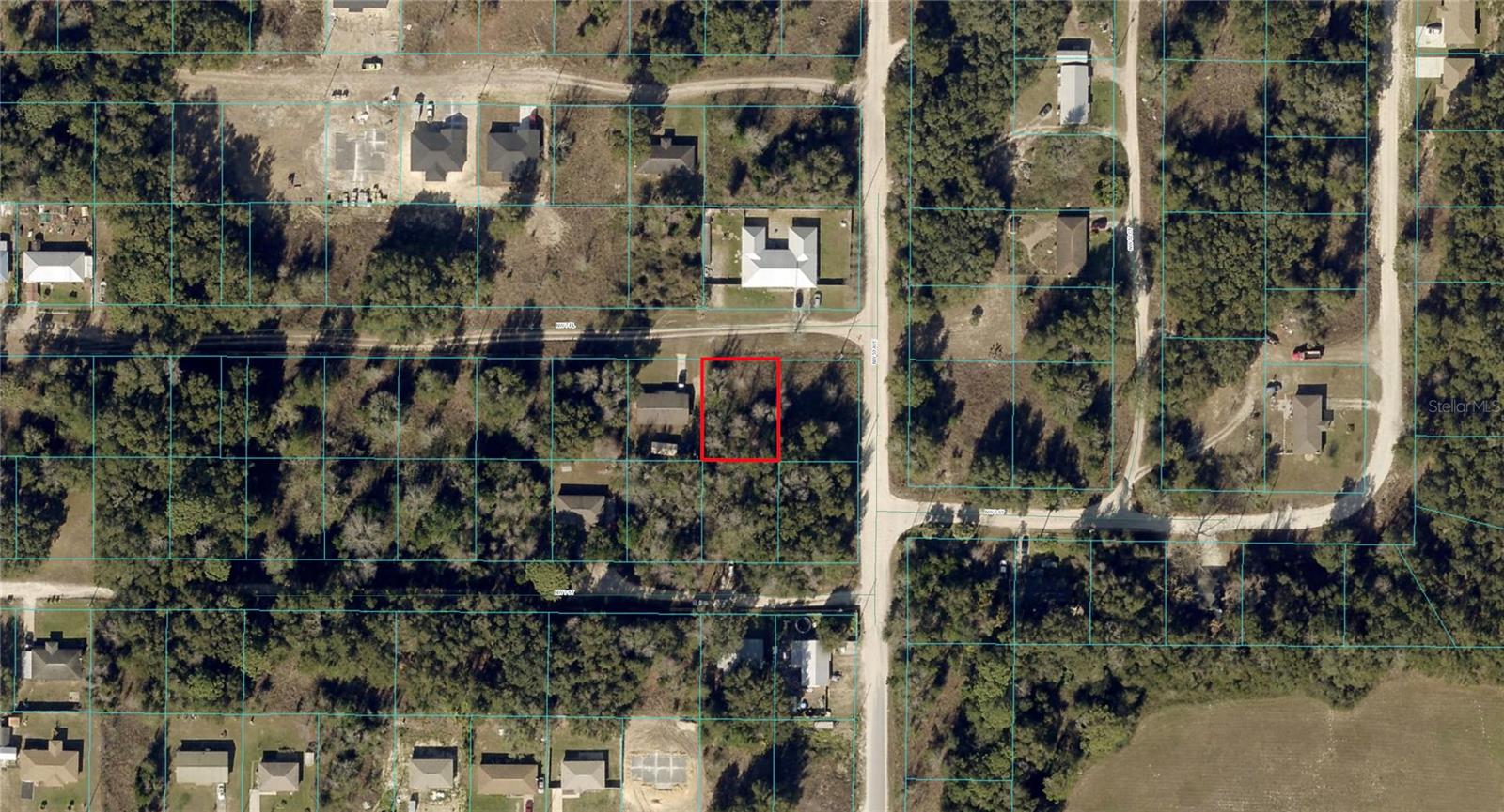 Just off the PAVED road in Ocala Ridge subdivision!. Lots of new single family homes going up in the neighborhood. Excellent road quality, corner lot. Very close to downtown Ocala, 5 or 6 minutes to World Equestrian Center, the Ocala strip and everything else is just minutes away from this perfect in town location. Saved thousands of dollars and time not having to get trees removed from this lot to build. This lot is Marion County parcel 2307-110-004. Approximately 7,405 Sq Ft. lot = 0.17 acres, a very good size being close to downtown. This lot was split off of a larger parcel. The street number listed in the address was made up for GPS mapping/driving purposes only and hasn't been assigned by the County yet. For directions, if you prefer you can copy and paste GPS Coordinates into Google Maps or Apples Maps, or use the address of a neighboring house. GPS Coordinates: 29.194386, -82.208381. Or you can use the address: 5332 NW 7th Pl, Ocala, FL 34482 (not official). This is Ocala Ridge Subdivision, and the seller has several other lots available in the subdivision. Priced to sell quickly.