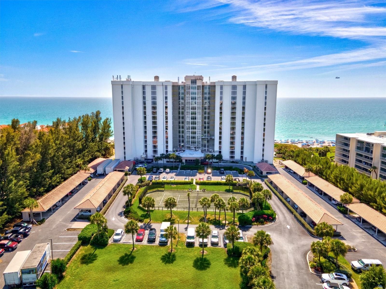 Price Reduced $100k—Welcome to Sea Gate Club #10F, a rare 10th-floor corner unit with sweeping, unobstructed Gulf views on Longboat Key. This 2-bed, 2-bath residence is filled with natural light and offers stunning sunsets from nearly every room—an ideal coastal retreat for relaxing or entertaining. Located in an intimate 89-unit beachfront community, Sea Gate Club offers a quiet, refined lifestyle with extensive recent upgrades, including impact windows, new roof, exterior renovation, pool, elevators, and more—no pending special assessments. Enjoy resort-style amenities: Gulf-front pool and spa, fitness center, tennis court, library, and social spaces, plus beachside extras like tiki huts and storage for bikes and water gear. Just minutes from St. Armands Circle, you’ll have easy access to dining, shopping, and island charm. Private, peaceful, and rarely available—this is Gulf-front living at its best.