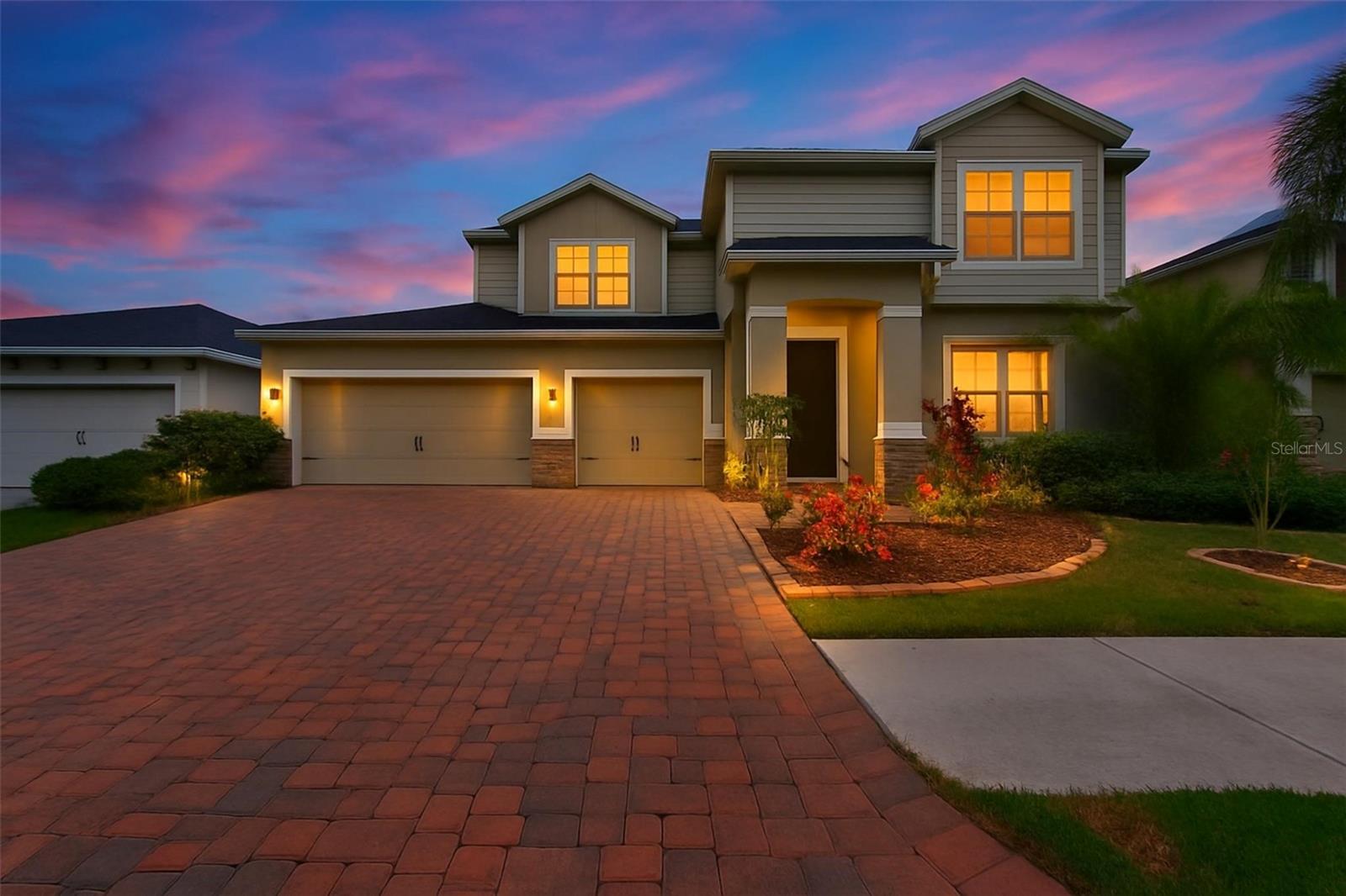WELCOME HOME! You’re going to LOVE this 4 bedroom, 3.5 bath, 3 car garage, IMMACULATE home in the gated section of Lake Lucaya! This home WOWS! This Guard Gated Community is the perfect place for you and your family to call home! As you drive up to the house you’ll immediately realize that PRIDE OF OWNERSHIP SHOWS just by looking at the BEAUTIFULLY MANICURED lawn and BEAUTIFUL PAVER BRICK driveway! Immediately upon entering the home you’ll appreciate the OPEN FLOOR PLAN and space this home offers. The Formal Dining Room and Living Room are the perfect place to host gatherings with family and friends or use the space for something else, playroom, office, 3rd Living Room - whatever you’d like. As you continue into this AMAZING home you’ll be ASTOUNDED at the true HEART OF THIS HOME - the KITCHEN & GREAT ROOM! This Kitchen is a CHEF’S DREAM! It boasts GRANITE COUNTERTOPS, UPGRADED CABINETS, Stainless Steel appliances, a double oven, GAS STOVETOP, and a HUGE ISLAND BAR - PERFECT for friends to gather around anytime of the day! This place was designed for ENTERTAINING guests! There is a very large EAT IN SPACE in the Kitchen and a very ROOMY and inviting GREAT ROOM too! As you head upstairs you’ll definitely appreciate the FLEX LOFT AREA. It is currently a 2nd LIVING SPACE but could easily be used as a Media Room, Office, Game Room or most anything else you’d like to use it for. The MASTER BEDROOM is the PERFECT RETREAT! The bedroom is MASSIVE - offering plenty of space to make this your personal oasis. The En Suite bathroom SHOWCASES DOUBLE VANITY SINKS with GRANITE tops, a VERY LARGE walk in shower and a Master Bedroom Closet that is simply - HUGE! The rest of the bedrooms are oversized and the Laundry Room is IDEALLY located upstairs so there is no walking laundry up and down the stairs to do laundry! You will also ABSOLUTELY LOVE the OVERSIZED 3 CAR GARAGE! Feel free to relax in the backyard and enjoy the FLORIDA weather most anytime in the Roof Over screened porch and patio. The backyard is the perfect size for your family and friends to hang out day or night! This neighborhood OFFERS TONS OF RESORT STYLE AMENITIES! The CENTERPIECE of the entire neighborhood is the MASSIVE 78 acre - LAKE LUCAYA! This lake allows the residents some of the most AMAZING SUNSETS & VIEWS you could ever see! Or you can spend your time on the pier, beach area, kayaking, canoeing, paddle boarding, or fishing! Lucaya Lake Club also offers tons of walking trails, a fantastic and thriving CLUBHOUSE where the community gathers to relax and make lifelong friends, a zero entry pool, fitness center, playground and splash park! This neighborhood is also perfectly situated and mere minutes from shopping malls, grocery stores, bowling alley, hospitals, I-75, I-4, the Suncoast Parkway and just about anything else you could want nearby. It is a very short drive to Apollo Beach with waterfront dining, boat charters, Downtown Tampa, area beaches, Tampa International Airport, Macdill Air Force Base, and Orlando. Hurry to see this house today before it slips away!