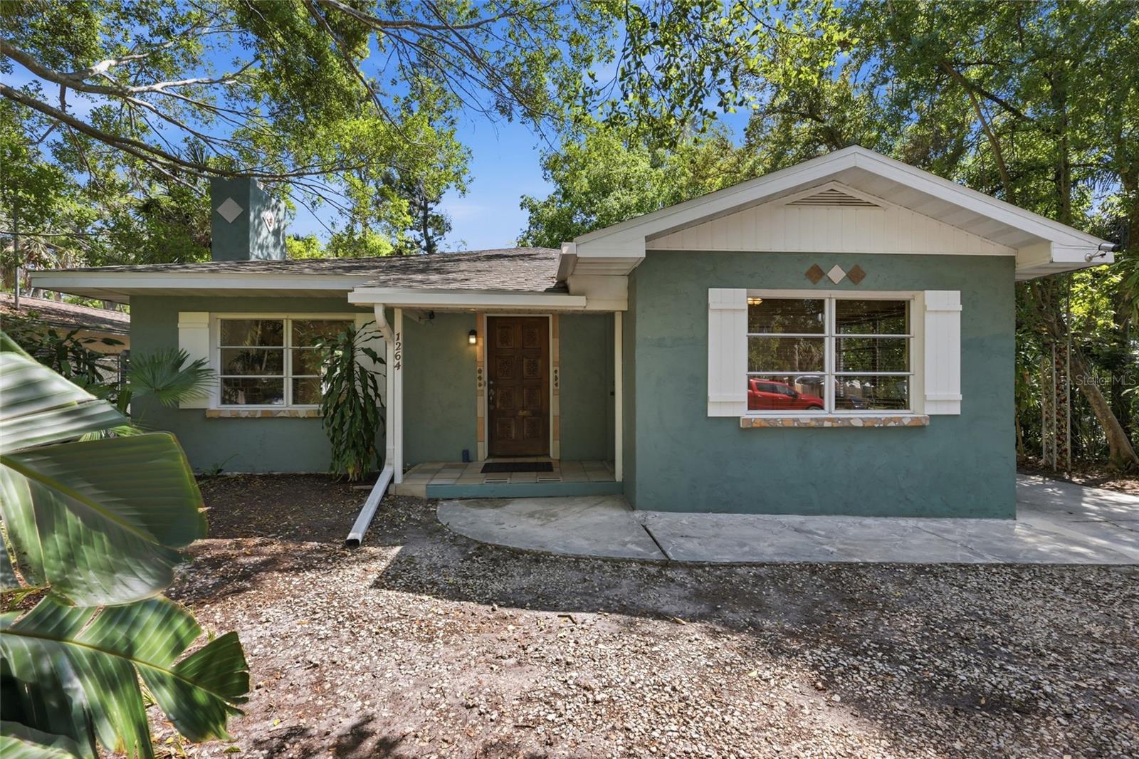 Multifamily investment opportunity (RMF Zoning) on the near north side of Sarasota in the heart of the highly sought-after Central Cocoanut Historic District. BLOCK CONSTRUCTION, three-bedroom, two-bathroom home WITH a one bed, one bath, 566 square foot in-law suite created from a garage conversion. The home is a split plan and all three bedrooms have exterior access.  The kitchen is bright and updated and opens to the shared lanai and utility room. In addition to the “in law” suite there is an attached 220 square foot studio with plumbing, offering creative or rental potential.  Situated in a vibrant, walkable neighborhood with bike lanes, you’ll enjoy easy access to downtown Sarasota, along with its renowned dining, shopping, arts, and cultural amenities. The Ringling College of Art and design is just a few blocks away and the adjacent North Trail Corridor is experiencing some of Sarasota’s most dynamic development. A short 10-minute drive over the Ringling bridge lands you in St. Armands Circle and the beaches of Lido and Longboat Key.