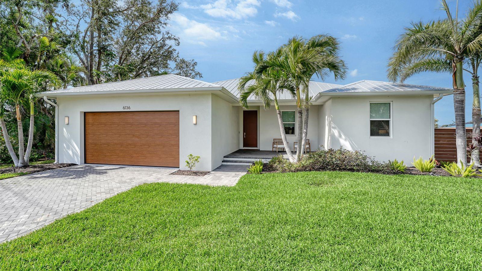 Built in 2016, this exquisite home is perfectly positioned at the end of a highly coveted canal in Aqualane Estates, offering unparalleled privacy and breathtaking water views. Designed with both elegance and resilience in mind, the property remained completely unscathed during Hurricanes Helene and Milton (12.5 feet above sea level as well as impact windows/slider), providing peace of mind for future homeowners. This exceptional 3-bedroom, 2-bathroom residence boasts soaring 10-foot ceilings, luxurious marble finishes, and a versatile bonus room—ideal as an office, playroom, or creative space. At the heart of the home, the open-concept living area seamlessly blends indoor and outdoor living, making it perfect for entertaining or unwinding in style. Step outside to your private waterfront oasis, where a stunning pool and hot tub (added in 2021) set the stage for unforgettable sunsets over the canal. Boating enthusiasts will appreciate the convenience of direct backyard access to Sarasota Bay, allowing for effortless days on the water. Beyond the home’s serene waterfront setting, you’re just one mile from pristine powdery sand beaches and mere minutes from Siesta Key Village, as well as everyday essentials like Publix, Costco, and more. Whether you’re seeking a full-time residence or a luxurious retreat, this Aqualane Estates gem offers the best of Florida living. Home can be purchased Fully Furnished and ready to be moved into!