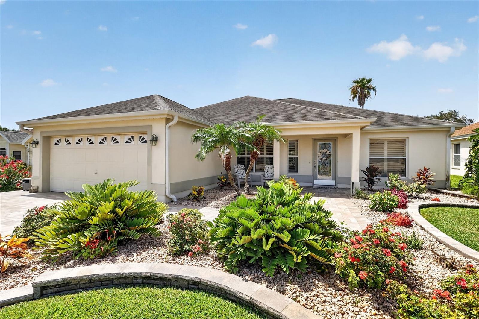 POOL HOME! BOND PAID! PRIME LOCATION! This is the one you’ve been waiting for—welcome to 1808 Santana Way in the highly desirable Tierra Del Sol South neighborhood of The Villages.

This 3-bedroom, 2-bath designer Cozumel model features inviting open living with a functional split-bedroom layout and quality block & stucco construction. Enjoy vaulted ceilings, ceiling fans, and plantation shutters throughout, creating a bright, comfortable home atmosphere.

Step outside to the true highlight—PRIVATE outdoor living. The covered exterior lanai and BIRDCAGE overlooking the sparkling POOL are ideal for entertaining and relaxing. The solar-heated pool, mature landscaping, and pavered driveway complete the exterior living picture.

Inside, the kitchen is well equipped with cream-colored soft close custom made cabinets with convenient pull-outs, stainless steel appliances, granite countertops, and recessed and pendant lighting.

The primary suite offers a spacious walk-in closet and a patio slider door to the pool. The en-suite bath features beautiful cabinetry, quartz countertops, dual sinks, and a glass door walk-in shower.

Designed for privacy, the split floor plan places two additional bedrooms on the opposite side of the home, creating a separate guest wing. The second bathroom includes a vanity with quartz top and a tiled tub/shower combination.

Additional features include a two-car garage with epoxied floors, a laundry area with storage cabinets, and attic access stairs. Roof and hot water heater (2018).

Location matters—and this home delivers – only minutes by golf cart to BOTH Spanish Springs Town Square and Lake Sumter Landing, offering shopping, dining, and live nightly entertainment. The Village of Tierra Del Sol South offers an outstanding location—just minutes to Tierra Del Sol, Laurel Manor, Savannah Center, and La Hacienda Regional Recreation Centers, as well as nearby country clubs and championship golf courses. Convenient access to CR 466 and US 441 places you close to shopping, restaurants, banks, medical, and more. Watch our walkthrough video of this magnificent pool home in an amazing location, then call today to schedule your private showing or virtual tour!
