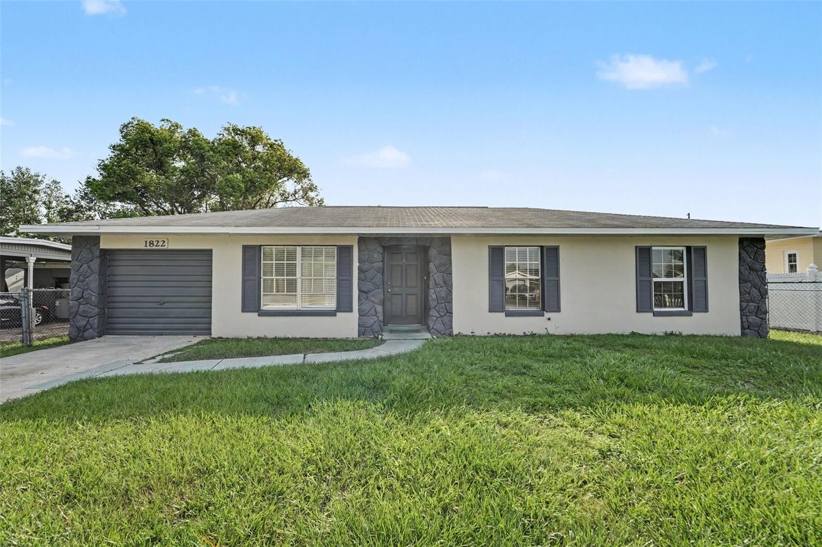 Come and see this move-in ready three-bedroom, two-bathroom home in Tiffany Terrace!

This home features a classic floorplan with tile flooring throughout, creating a seamless and airy flow from room to room. The thoughtfully updated kitchen boasts granite countertops and stainless steel appliances, opening perfectly into the main living spaces for easy daily living. The primary bedroom provides added convenience with its own attached en-suite bathroom. Step outside to enjoy a private, fully fenced-in backyard that offers an excellent space for outdoor entertaining or relaxing.

Located in the established community of Medallion Estates, this home offers a prime location just minutes from SR 417 and SR 408, and is a quick 20-minute drive to the Orlando International Airport for effortless commuting and travel.

Schedule your private showing today!