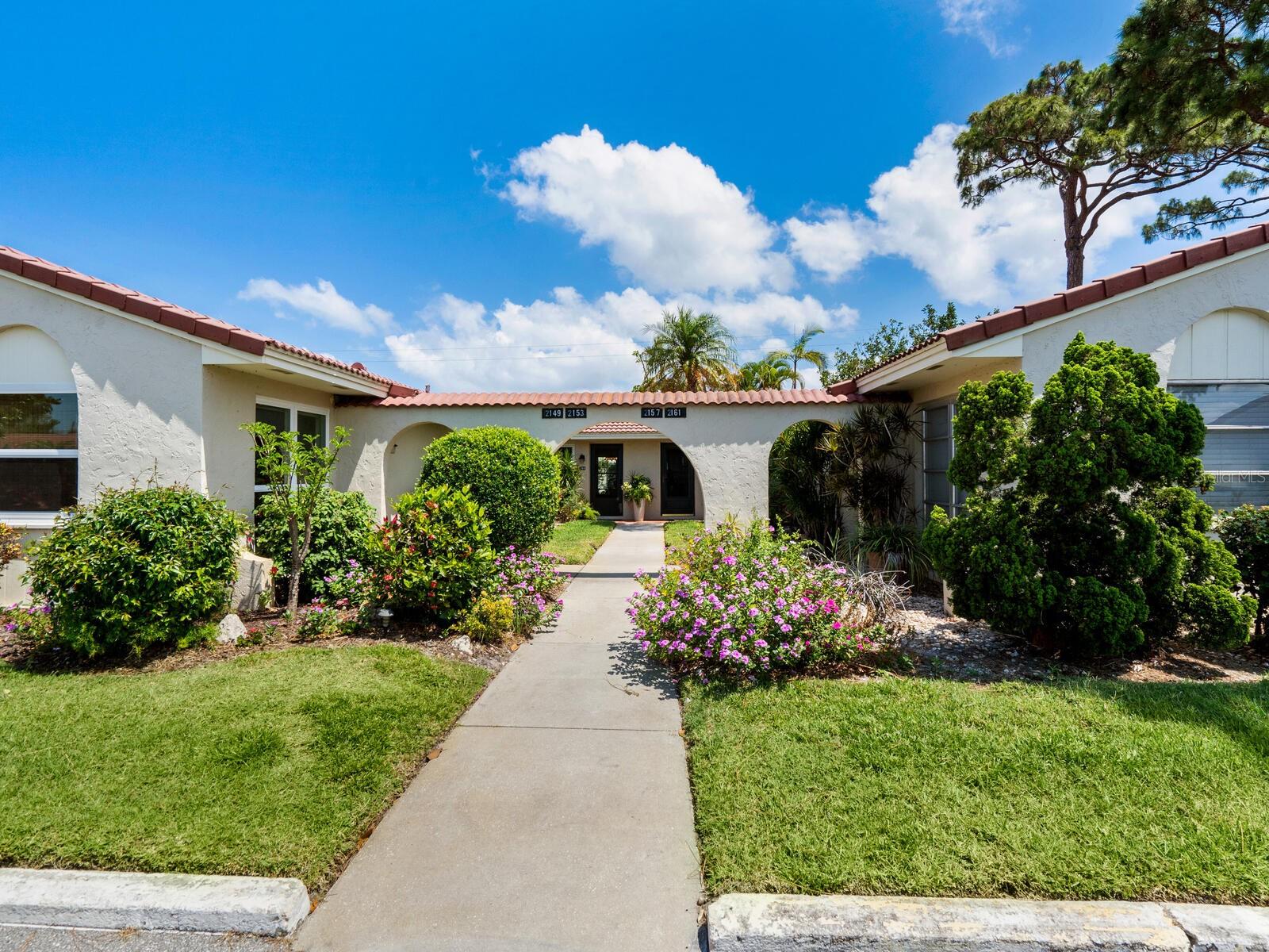 Located in the heart of Sarasota, this ground floor 2/2 villa is very comfortable, manageable and private. Tucked away in a private courtyard, this villa has been lovingly maintained and upgraded by its owner. The windows and sliding glass door were replaced in 2016 with PGT vinyl frame impact double hung windows and impact sliding glass in the sliding door. The HVAC unit was replaced in 2022. The interior of the entire villa was freshly painted in 2022. The kitchen has cabinets galore and plenty of counter space. The laundry closet has a washer and dryer and storage space. The side door in the kitchen and the slider in the dining area lead to the private patio in the back of the villa. With permission from the Association, this patio can be screened in. There is a large walk in the closet off of the primary bedroom plus an ensuite bath with a large vanity and a step-in shower. Grab bars have already been installed in the shower. There is a full guest bath with tub/shower. More closet space and storage in the second bedroom plus in the large hallway closet. This active 55+ community has a swimming pool. Each unit has its own parking space plus guest spots. There are a total of 48 units in this private enclave. Conveniently located close to shopping, restaurants, medical offices and houses of worship plus only a few miles away from America's #1 Beach at Siesta Key. Being sold turnkey furnished, this villa is move in ready.