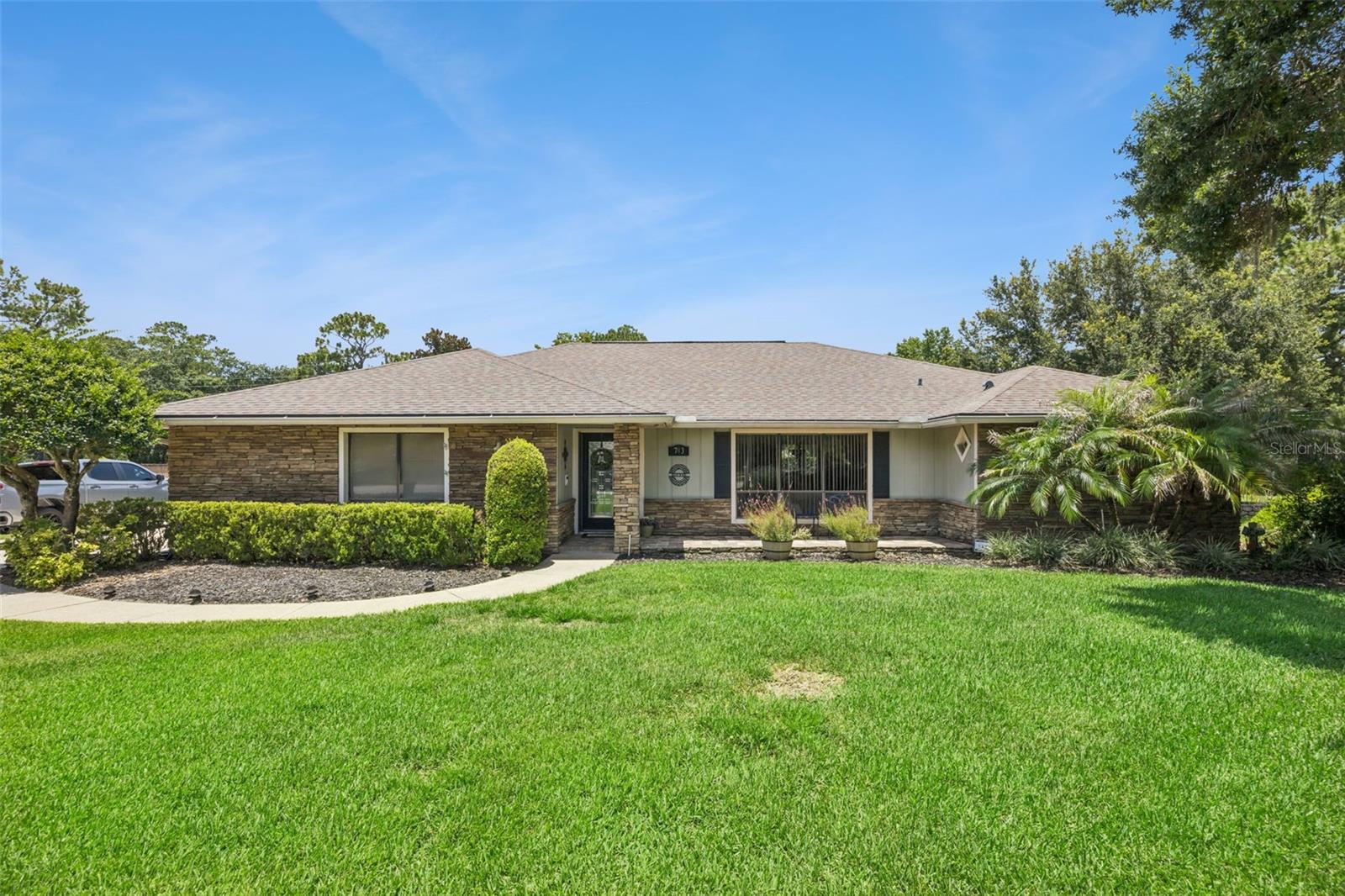 Welcome home to 783 Keenland Pike! This 4 bedroom 2 bath boasts of desirable features! A front porch sitting area to enjoy a cup of coffee in the mornings. The kitchen details include an eat-in space with a coffee bar area, real wood two tone cabinets with plenty of storage space for all those cooking essentials, stainless appliances and granite countertops. A formal sunk-in living room and dining room ideal for hosting gatherings and holidays. The spacious master suite has wood like tile, double sinks and a huge walk-in shower giving luxury feels! Sliding glass doors leading out to the patio area too! A beautiful wood burning fireplace in the living room perfect for those cool FL nights. This split floorplan includes 3 larger rooms on the other side of the home with built-in closets, guest bath with double sinks and access to the pool. The back screened in patio with tongue and groove ceilings, brick pavers and ample space for entertaining. Take a dip in the pool as well! Off the screen patio is a paver pad to have your grill or blackstone! This half acre lot has plenty of backyard space even a shaded quiet sitting area with a firepit. This home hasn't missed any detail and is the most perfect home for YOU! Schedule a showing today as this home wont last long!! Conveniently located near shopping, dining, major highways and Downtown Lake Mary. Roof is 2013 & A/C is 2020