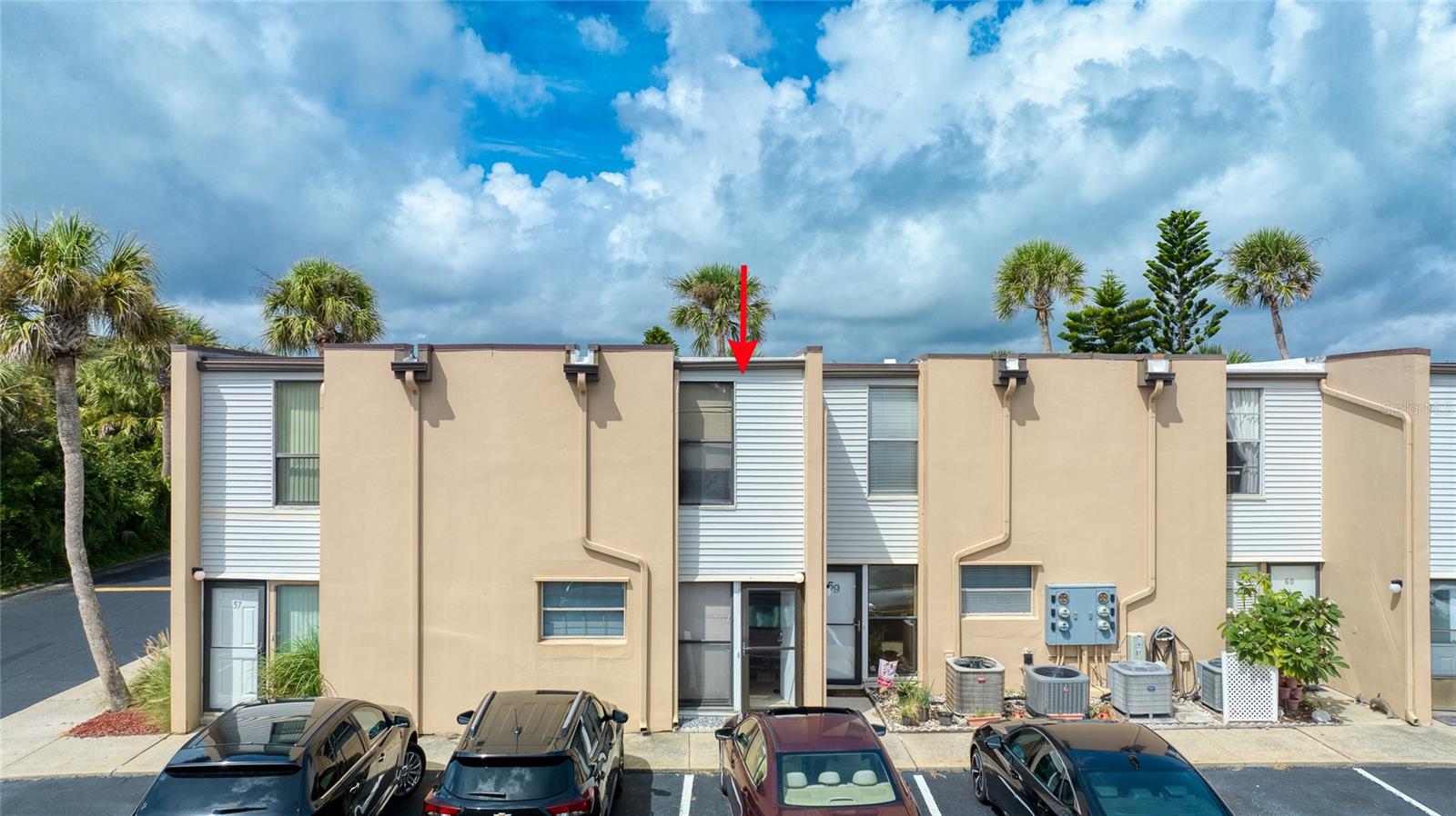 Experience the ease of coastal living in this welcoming Ormond Beach condo, just steps from the ocean. The first level features a comfortable living area with tile flooring throughout, a well-equipped kitchen with newer appliances, and a bright dining space that flows seamlessly onto a private screened porch, the perfect place to savor your morning coffee or unwind in the fresh sea air. Upstairs, you'll find two generously sized bedrooms and bathrooms, offering ample comfort and privacy. Everyday living is made simple with in-unit laundry, assigned parking, and a pet-friendly policy that caters to both full-time residents and vacationers. The community offers 3 swimming pools for relaxation, while HOA dues conveniently cover water, sewer, cable, internet, trash, and building insurance, ensuring truly hassle-free ownership. Whether you're seeking a year-round home, a beachside retreat, or an investment property with rental potential, this condo delivers an exceptional opportunity in a prime coastal location.
