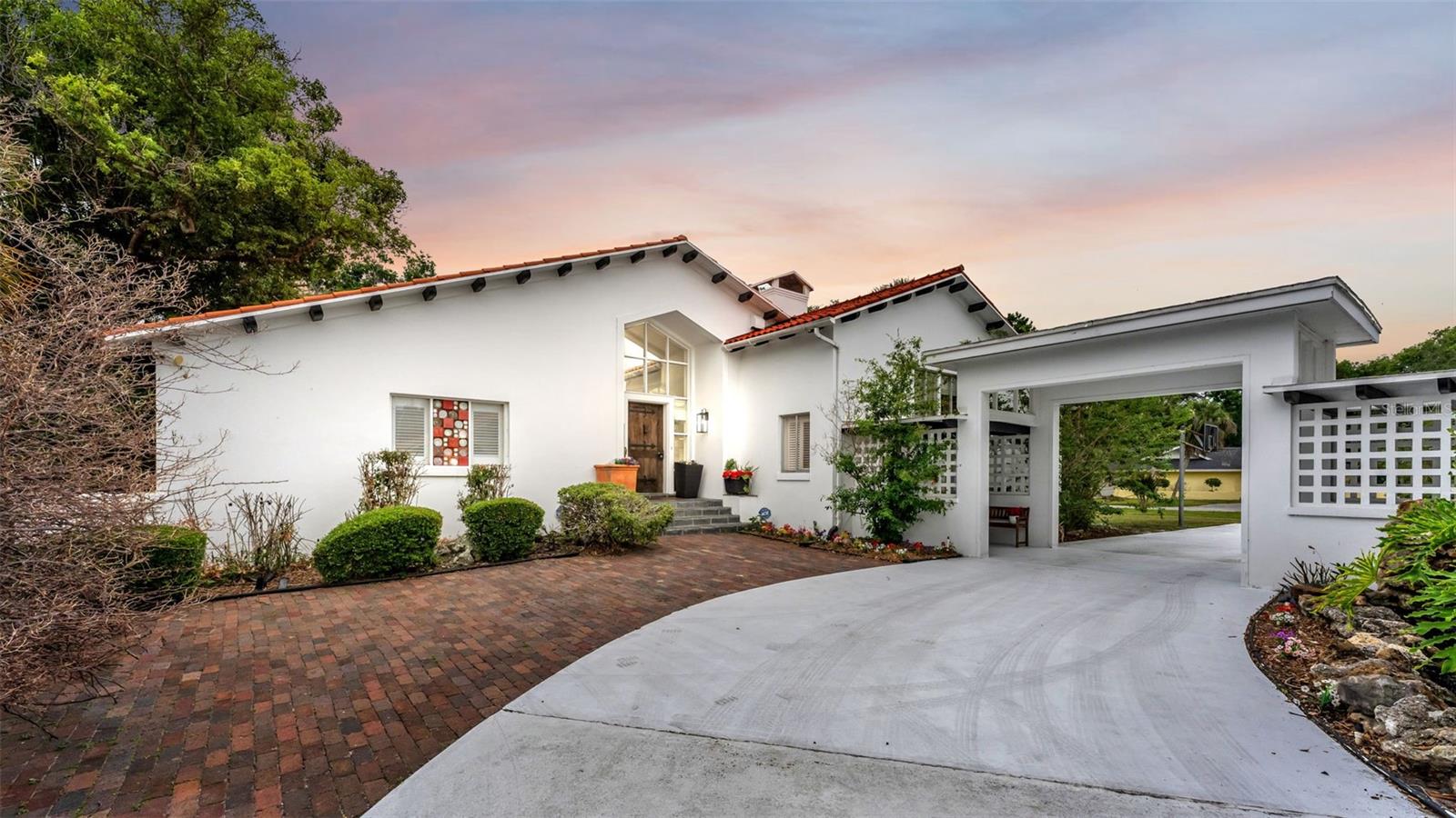 MUST SEEiii   Exceptional Golf Course Estate in Lakeland's Historic Lone Palm!

Positioned along the 13th hole of Lakeland's historic Lone Palm Golf Club, 421 Lone Palm Drive is a rare architectural estate that offers privacy, scale, and timeless distinction.
Set on approximately 0.84 acres, this distinctive property features about 3,500 square feet of heated and cooled living space and nearly 6,300 square feet under roof, including an impressive approximately 1,300-square-foot four-car garage. Designed for indoor-outdoor living, the home is defined by dramatic architectural lines, expansive covered areas, abundant natural light, and generous spaces for entertaining, all contributing to its true estate-style presence. Residents also enjoy access to Lone Palm's evolving club lifestyle, including a brand-new multimillion-dollar, state-of-the-art pickleball facility and a soon-to-be-completed croquet field, adding even more long-term appeal. For buyers seeking something truly beyond the ordinary, 421 Lone Palm Drive is a one-of-a-kind Lakeland property offering golf course positioning, privacy, character, and enduring elegance.