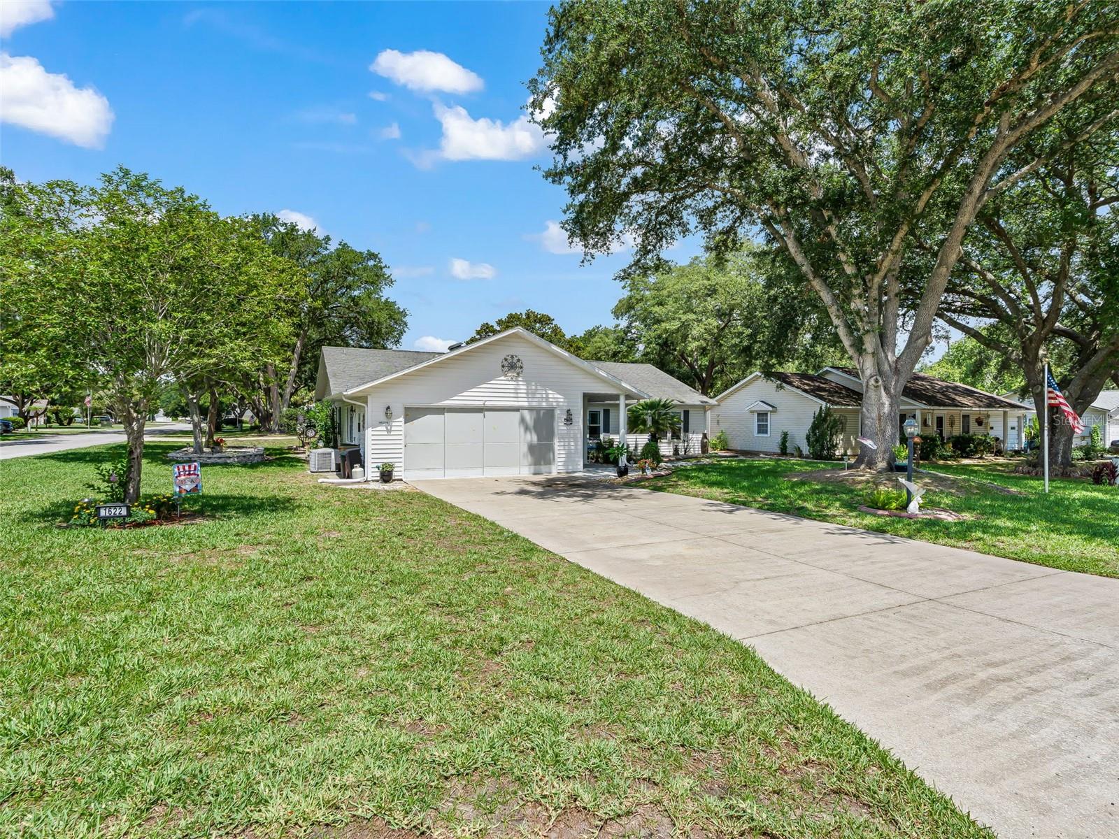 SCOTTISH HIGHLANDS 55+ ACTIVE COMMUNITY.  THIS  CUSTOM BUILT HOME FEATURES NUMEROUS UPGRADES AND THOUGHTFUL IMPROVEMENTS THROUGHOUT.  FLORIDA ROOM ADDS AN ADDITIONAL 200 SQ FT OF LIVING SPACE.  SPACIOUS FLOOR PLAN OFFERS A LARGE LIVING ROOM FOR ENTERTAINING AND EVERYDAY LIVING WITH BAMBOO FLOORS LEADING INTO THE FORMAL DINING ROOM.  UPDATED KITCHEN IN 2024 WITH QUARTZ COUNTERTOPS AND BACKSPLASH, CUSTOM CABINETRY WITH PULL OUT DRAWERS, LARGE WALK-IN PANTRY WITH CUSTOM CABINETRY AND DRAWERS GREAT FOR STORAGE OR CRAFT/HOBBY ROOM. STAINLESS STEEL APPLIANCES, DINETTE AREA.  NEW WINDOWS 2019.  THE PRIMARY BEDROOM HAS TILED FLOORS, A LARGE WALK-IN CUSTOM CLOSET WITH SHELVING AND DRAWERS, UPDATED SHOWER AND VANITY.  GUESTS WILL APPRECIATE THE RENOVATED GUEST BATH WITH 2026 WALK-IN SHOWER AND NEWER VANITY.  AN ADDITIONAL FLEX ROOM CAN BE A THIRD BEDROOM OR OFFICE/DEN.  ENJOY THE YEAR AROUND FLORIDA ROOM  AND OUTSIDE PATIO WITH SHARK COATING INCLUDING WALKWAY.  FOYER CLOSET HAS CUSTOM CABINETRY.  SCREENED GARAGE DOOR, GUTTERS, CROWN MOLDING, NEW GARAGE DOOR SPRINGS, LEAF GUARDS, NEW BLOWER AC 2026, NEW ICE MAKER 2026, WATER HEATER 2018. A ONE OF A KIND FLOORPLAN FOR SCOTTISH HIGHLANDS.  COME AND ENJOY ALL THE COMMUNITY HAS TO OFFER:  INDOOR OLYMPIC POOL, SPA, OUTDOOR POOL, TENNIS, PICKELBALL, RECREATION BUILDING WITH STAGE AND CRAFT ROOMS, BILLIARDS, STORAGE FOR YOUR RV/BOAT AND MORE!! GREAT CONVENIENT LOCATION CLOSE TO SHOPPING, RESTAURANTS, WORSHIP AND MEDICAL FACILITIES.