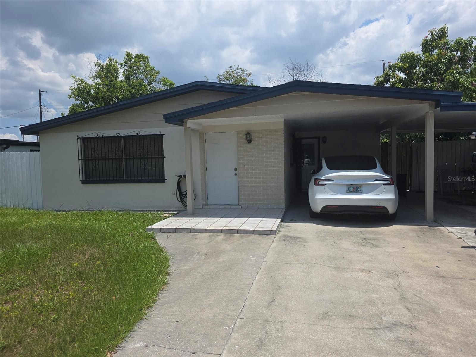 Property includes a mango tree and in a perfect location in Tampa.