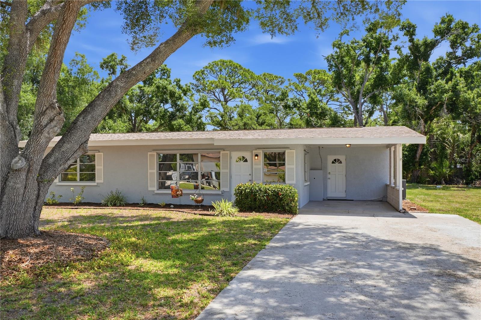 Charming Sarasota pool home with endless potential! Located within Sarasota city limits, this 2-bedroom, 1-bath residence offers approximately 1,000 square feet of comfortable living space on an oversized quarter-acre lot. Inside, you’ll find new luxury vinyl flooring throughout the living room and bedrooms, creating a fresh and modern feel. The roof is only 6 years old, offering added peace of mind for the next owner.
Step outside to your own backyard retreat featuring an in-ground pool and abundant yard space with endless possibilities to create the private outdoor oasis you’ve been dreaming of—perfect for entertaining, relaxing, or future enhancements.
Conveniently located just minutes from I-75, downtown Sarasota, shopping, dining, and world-renowned Gulf Coast beaches, this property offers the perfect combination of location, lifestyle, and opportunity. Whether you’re looking for a primary residence, seasonal getaway, or investment property, this Sarasota gem is full of potential.