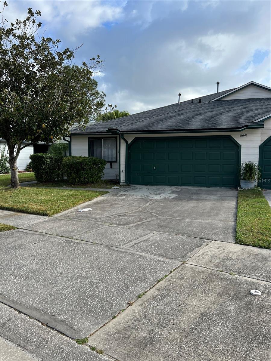 Beautiful home 3/2 with screened enclosed patio and unique atrium that brings in great natural lighting. New exterior and interior paint 2023, new tiled floor in primary bedroom and bathroom with vanity and vanity light in 2022, roof 2018. Garage door replace 2018, A/C was new in 2016, water heater and gas line 2013. Community pool nearby for "The Village" of Whisper Lakes only. Whisper Lakes has recreation facilities, playground, parks and near lots of restaurants and shopping. Good for investor or handy man.